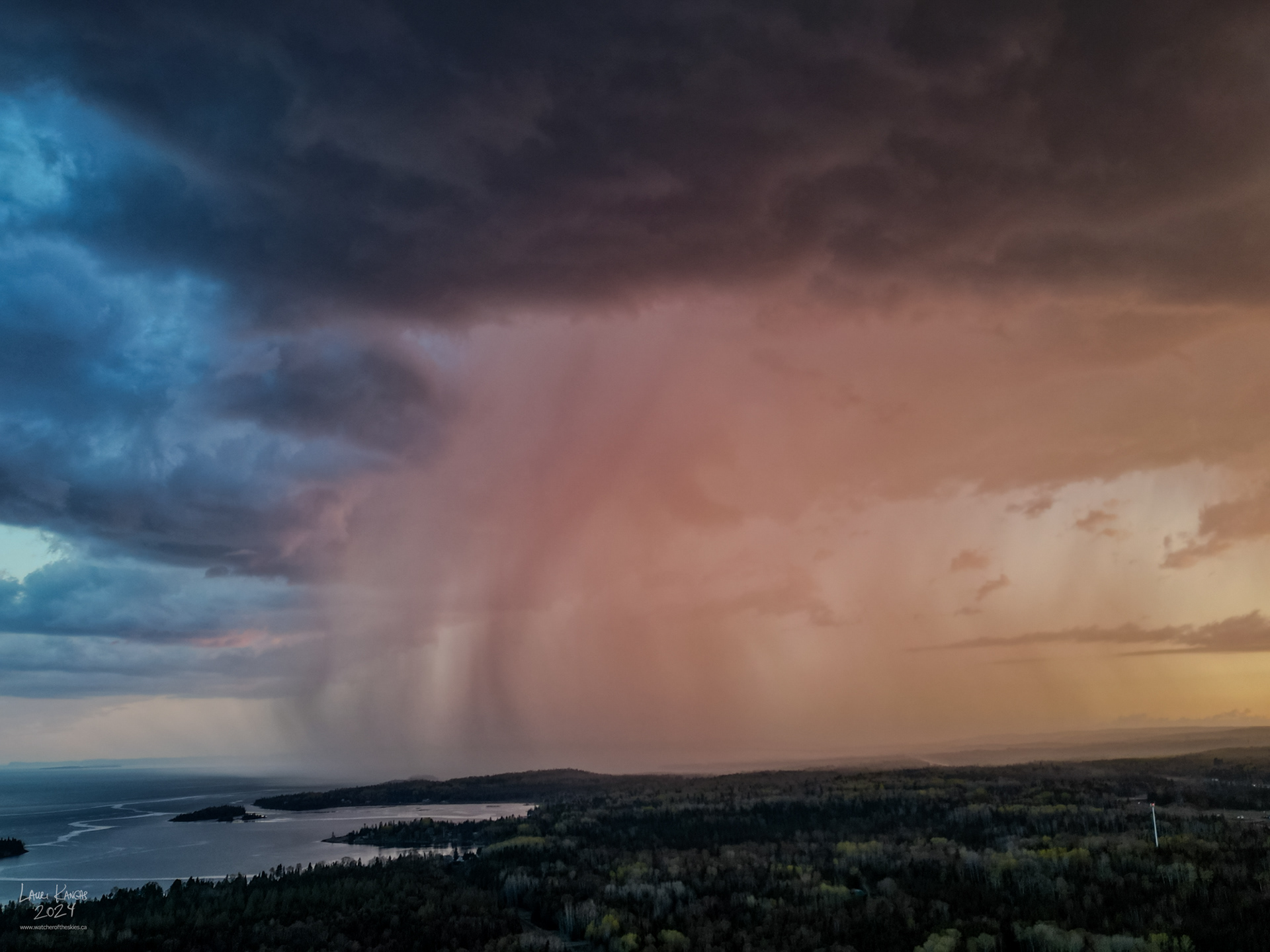 Aerial photo of squall at sunset over Shuniah, Ontario - May 18 2024