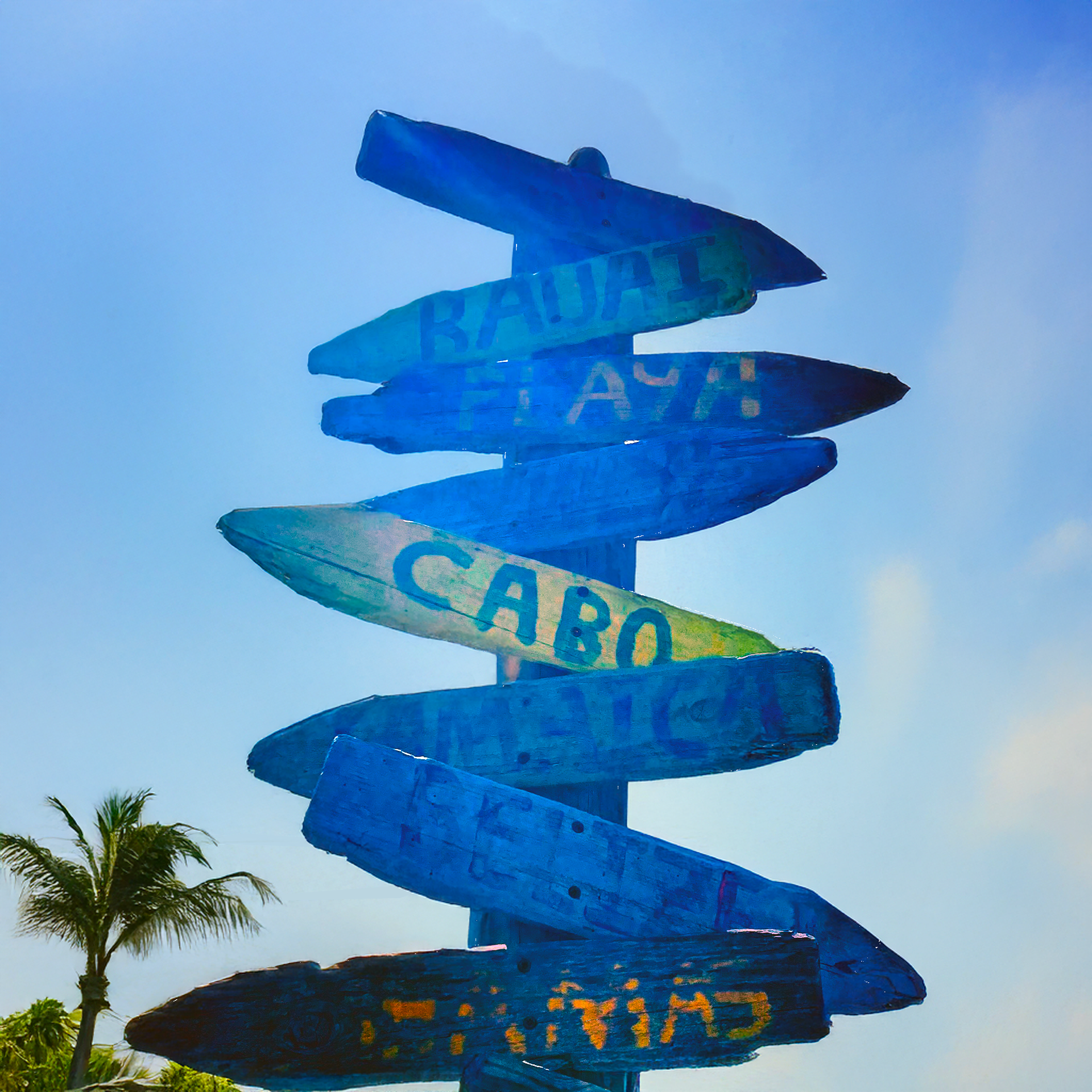 Directional beach arrow signs made with driftwood