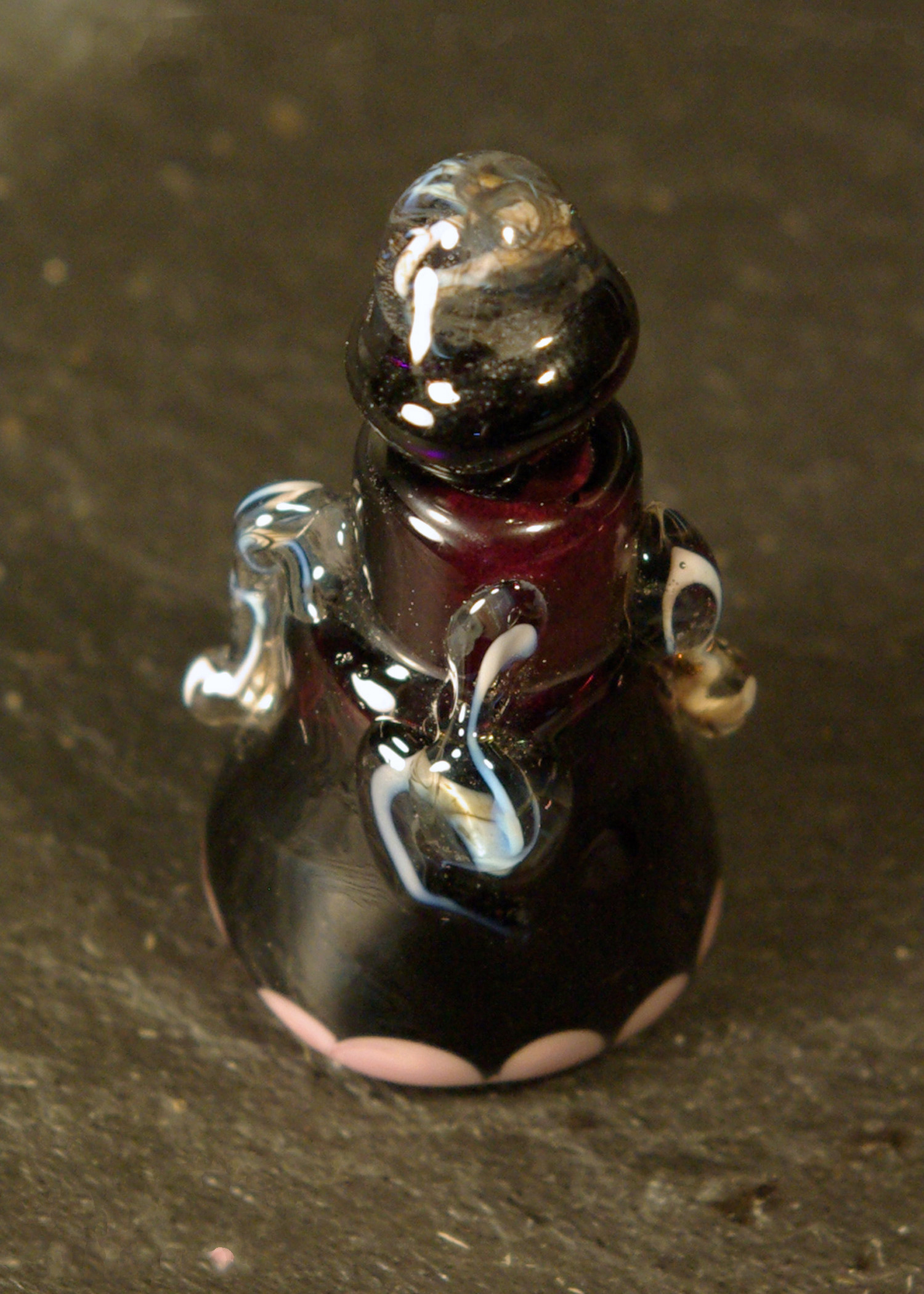 small lampworked and blown glass bottle with stopper