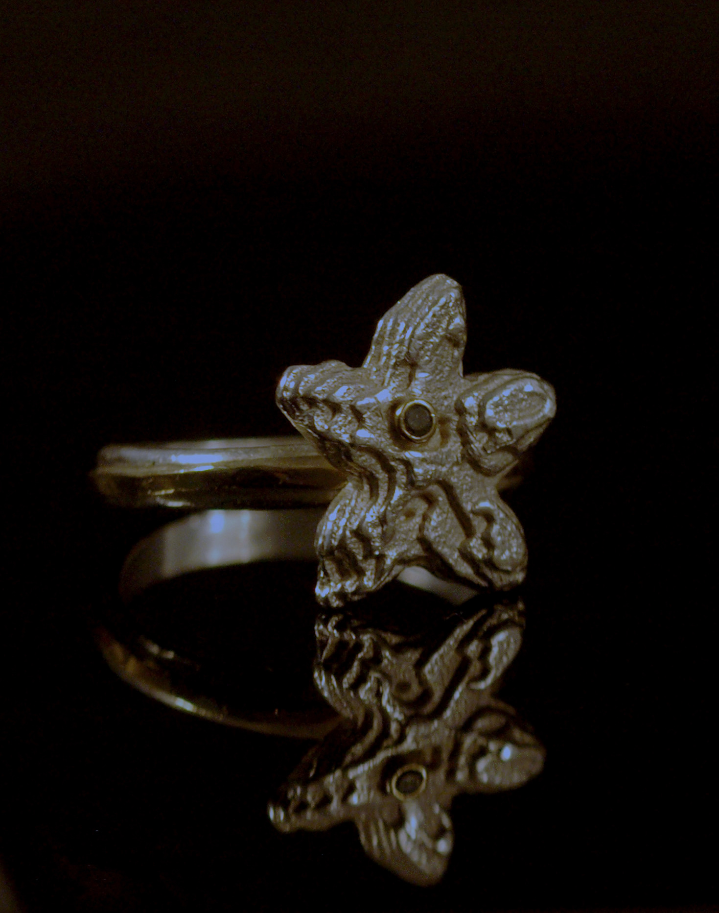 starfish ring, cuttlebone cast sterling silver, blue-green diamond in 14Ky gold, gold & silver band