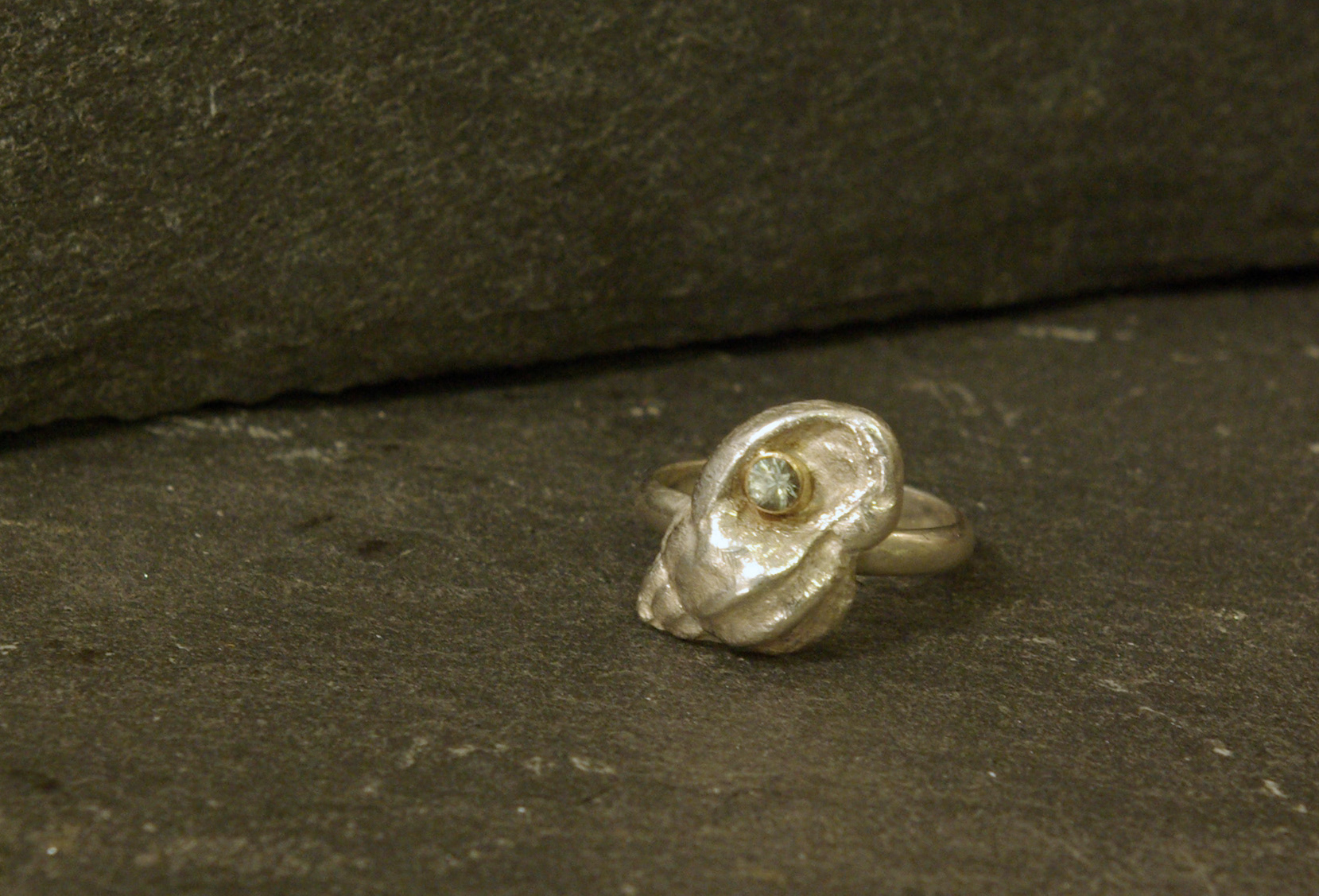 shell ring, cuttlebone cast sterling silver, blue-green sapphire in 14Ky gold