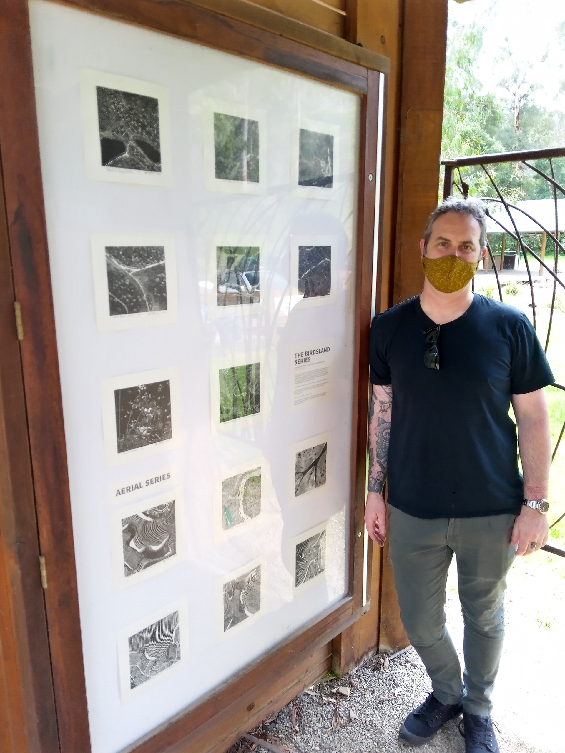Shaun after installing the artwork