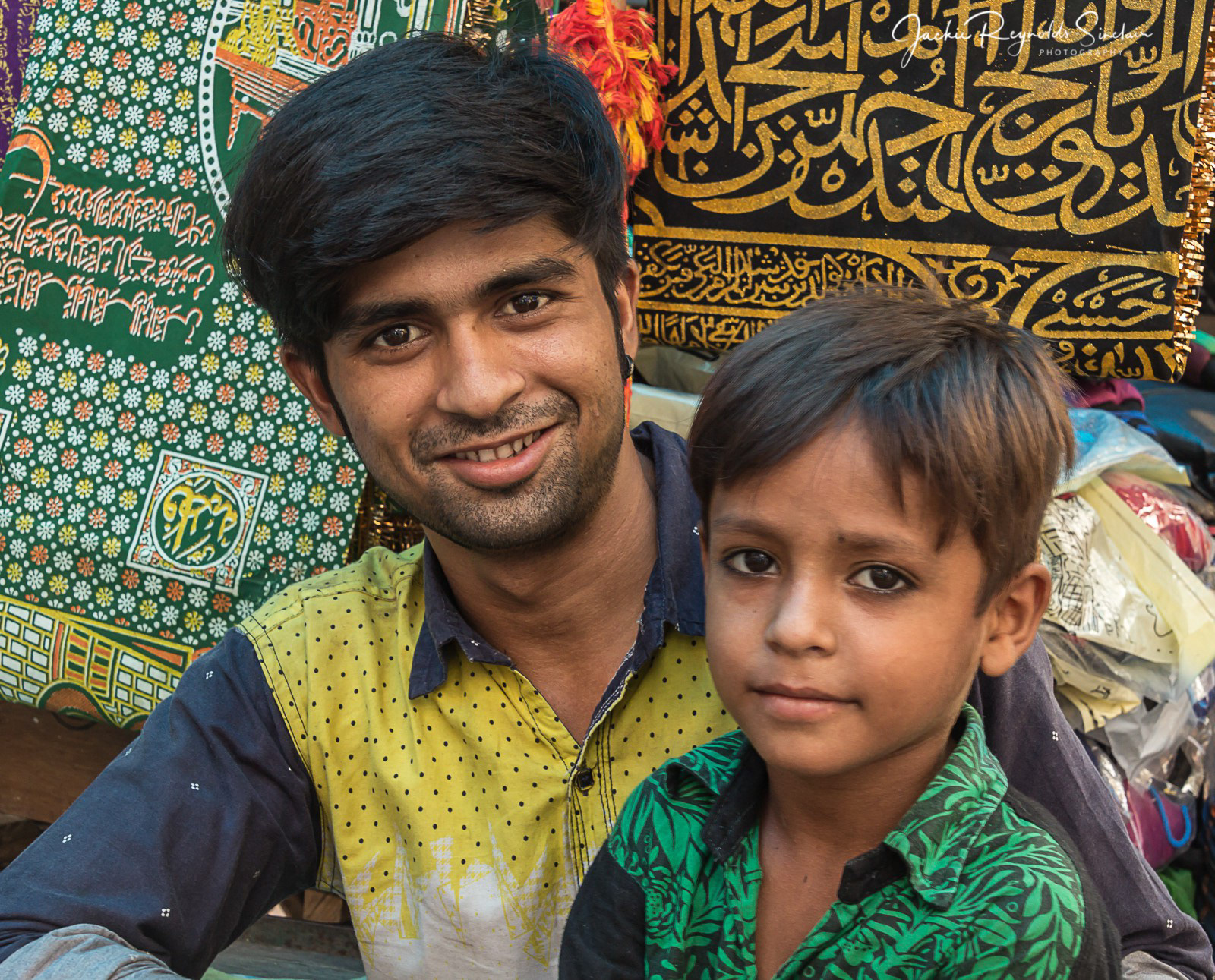 A sari seller and his son at Basti Hazrat Nizamuddin, Delhi