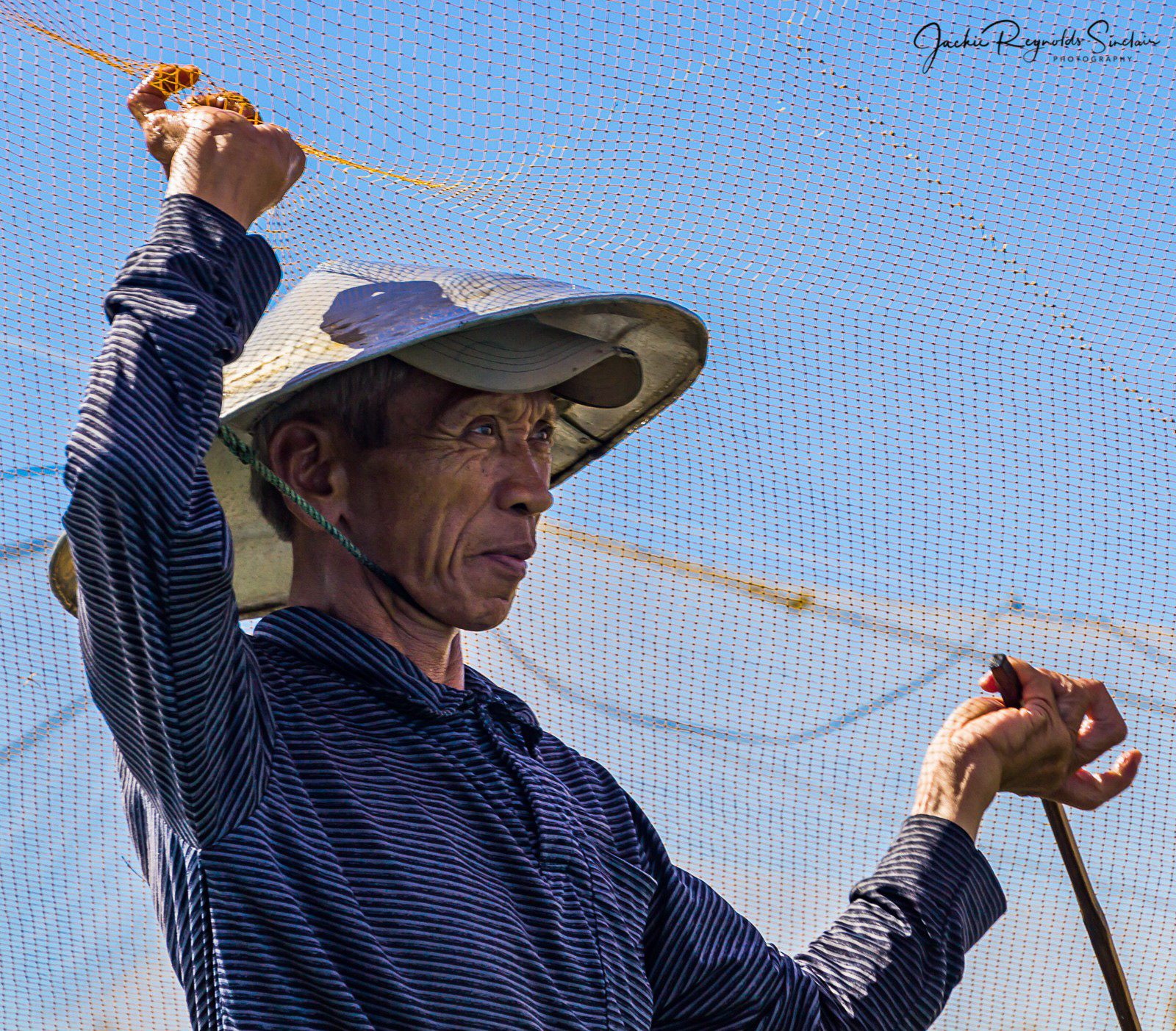 Mo, a fisherman for over 50 years on the Thu Bồn River near Hoi An