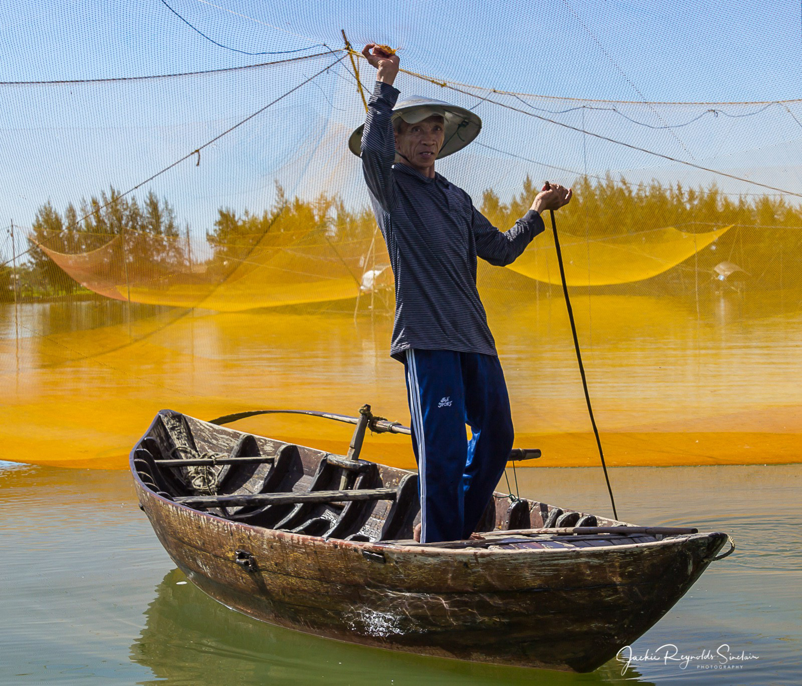 Mo, a fisherman for over 50 years on the Thu Bồn River near Hoi An