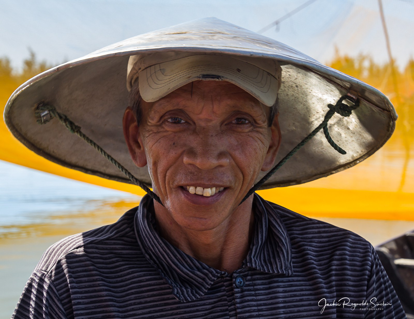 Mo, a fisherman for over 50 years on the Thu Bồn River near Hoi An