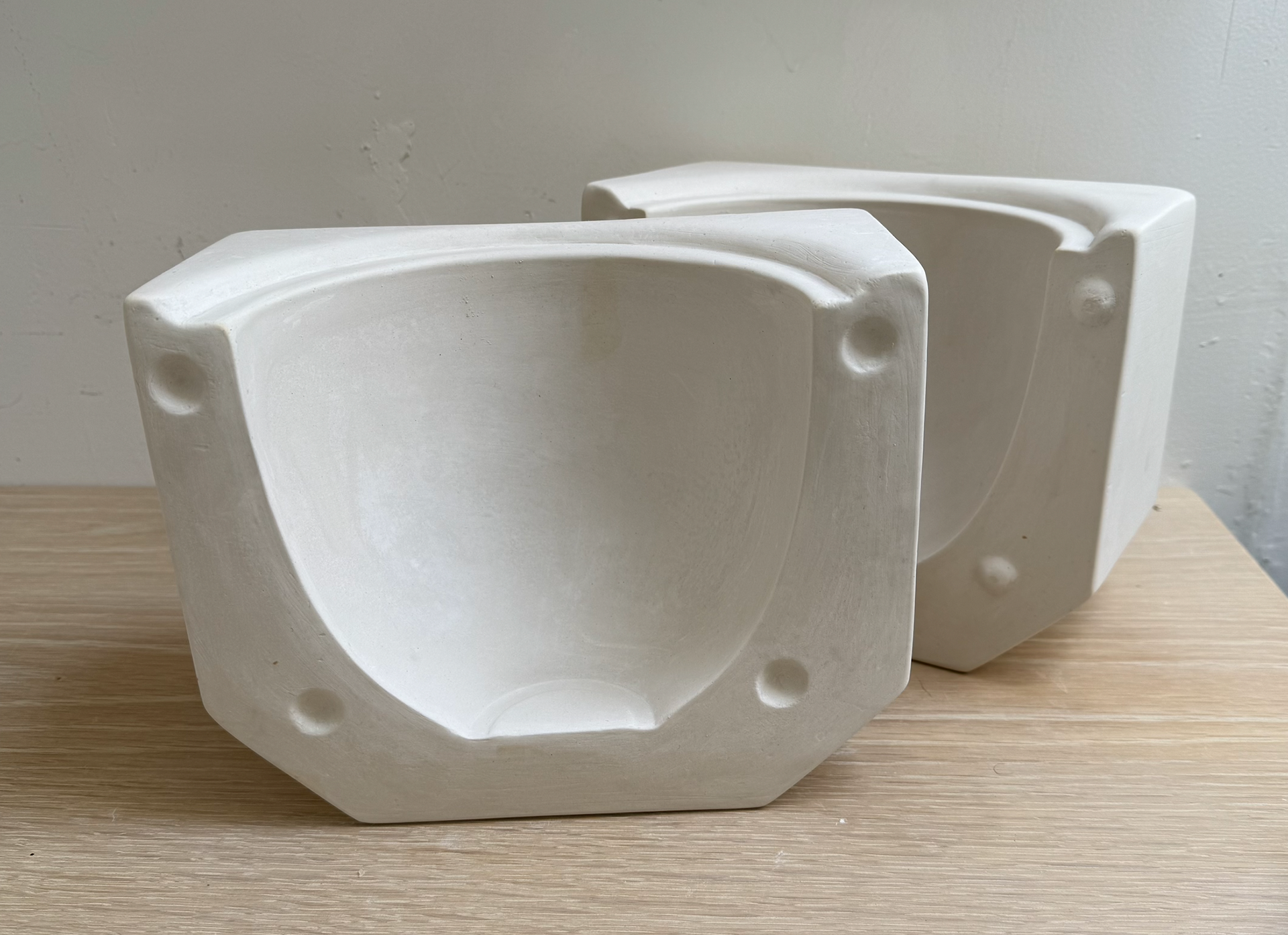 This original planter was glued to a wooden frame, each plaster part had to be made twice to get a perfect fit. Both parts required hours of sanding to finish them since the frame wasn't built well.