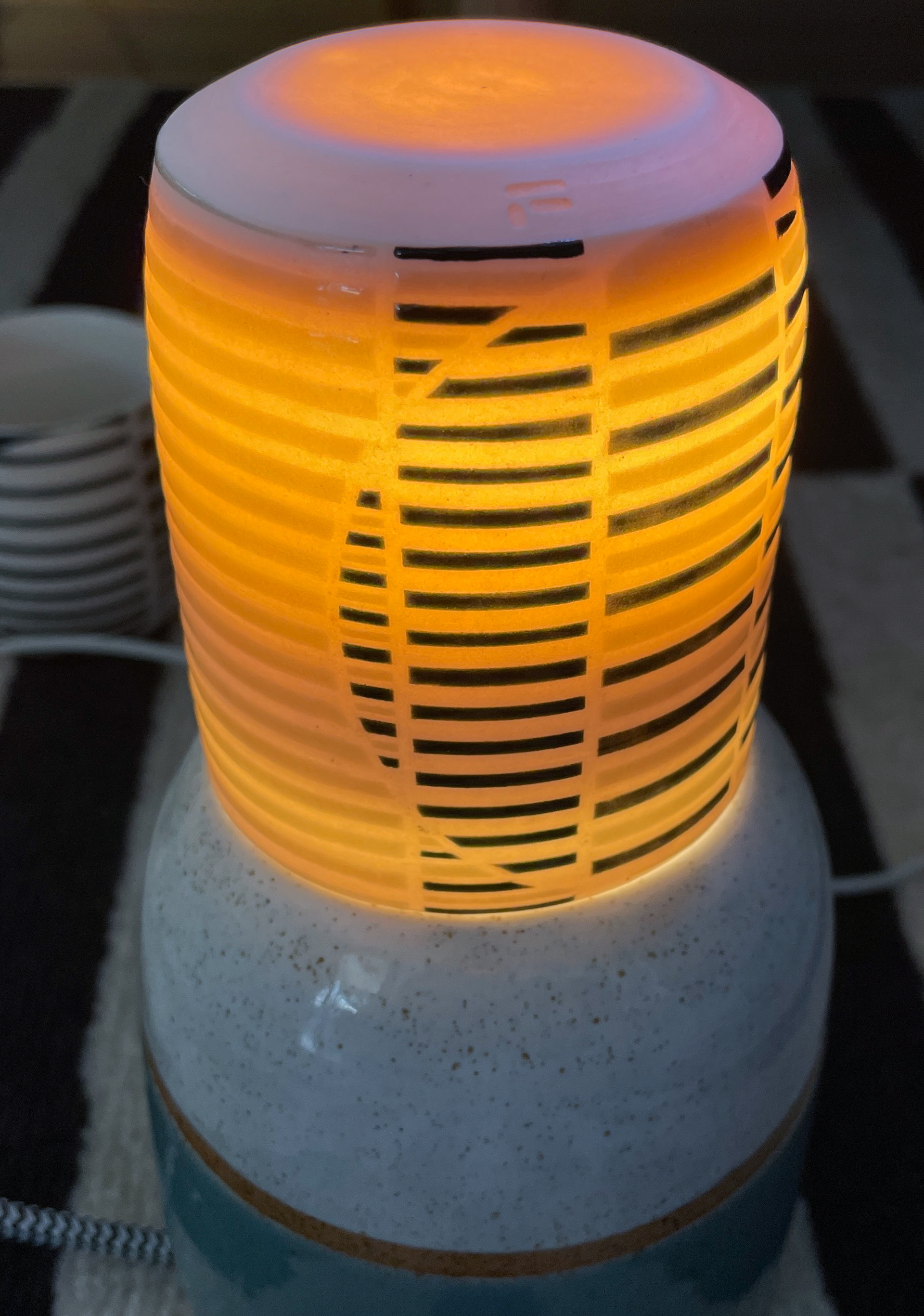 Lighting test - porcelain cup over a lamp to test the translucency