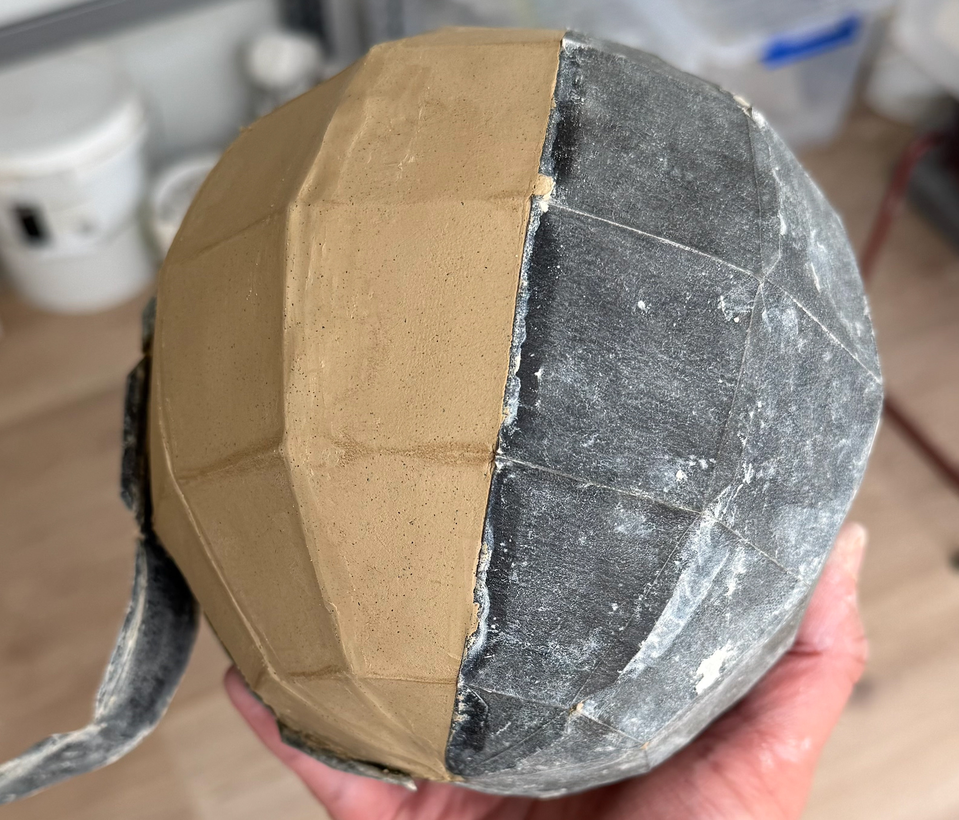 Stoneware Hebdomicontadissaedron made from clay slabs, with roofing paper templates still attached