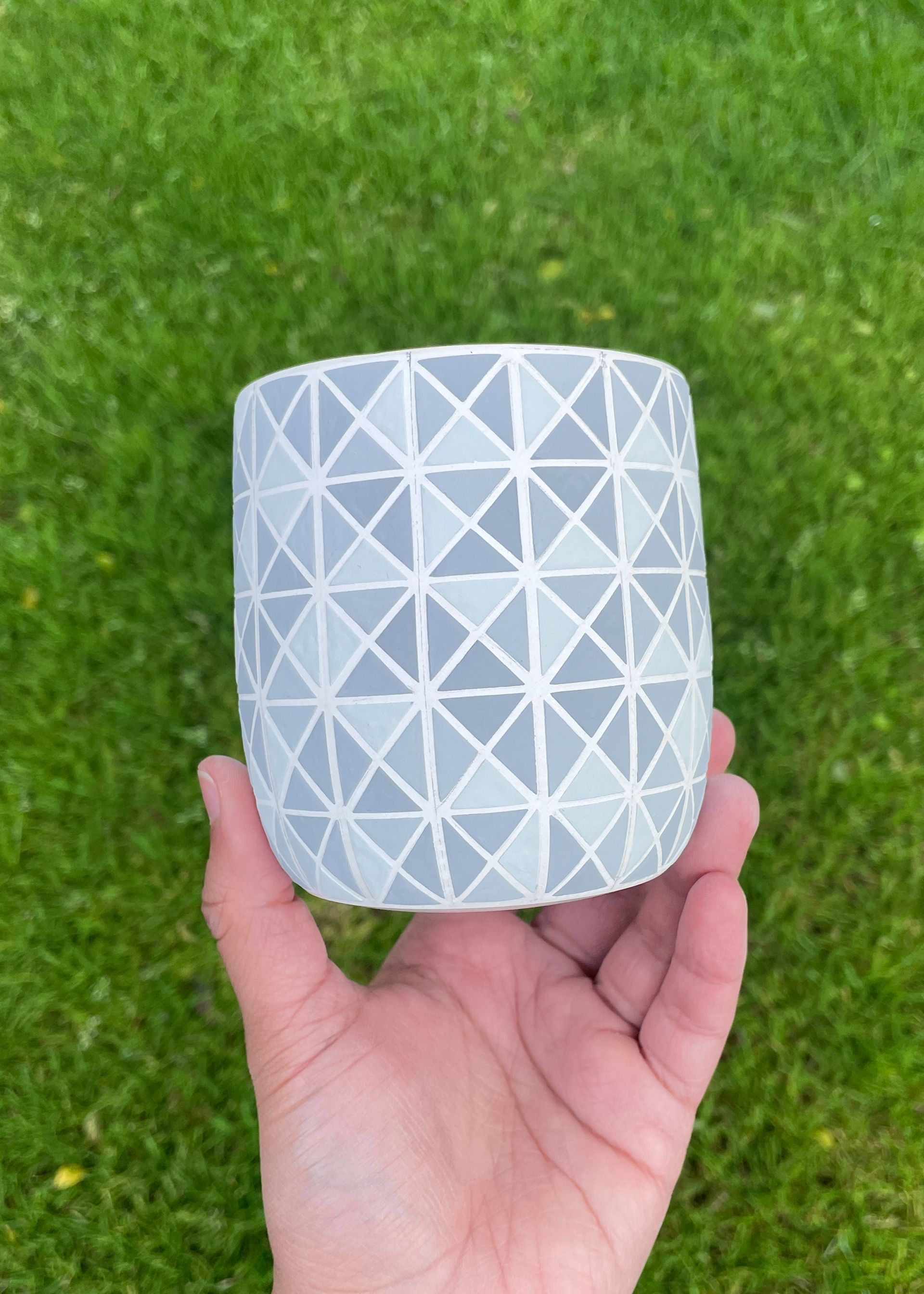 Porcelain cup before glaze firing