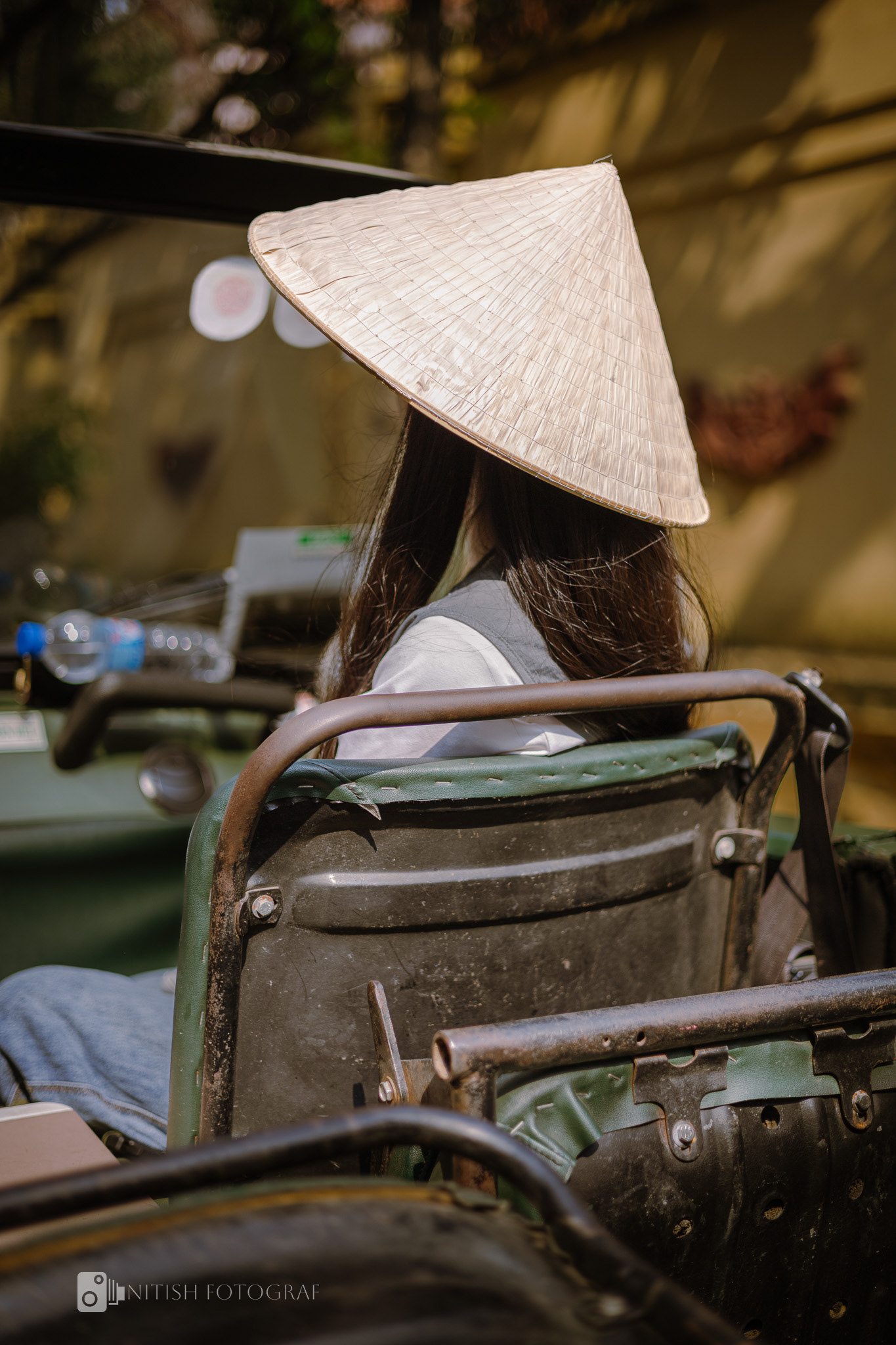 A glimpse of elegance through the timeless simplicity of a vietnamesehat