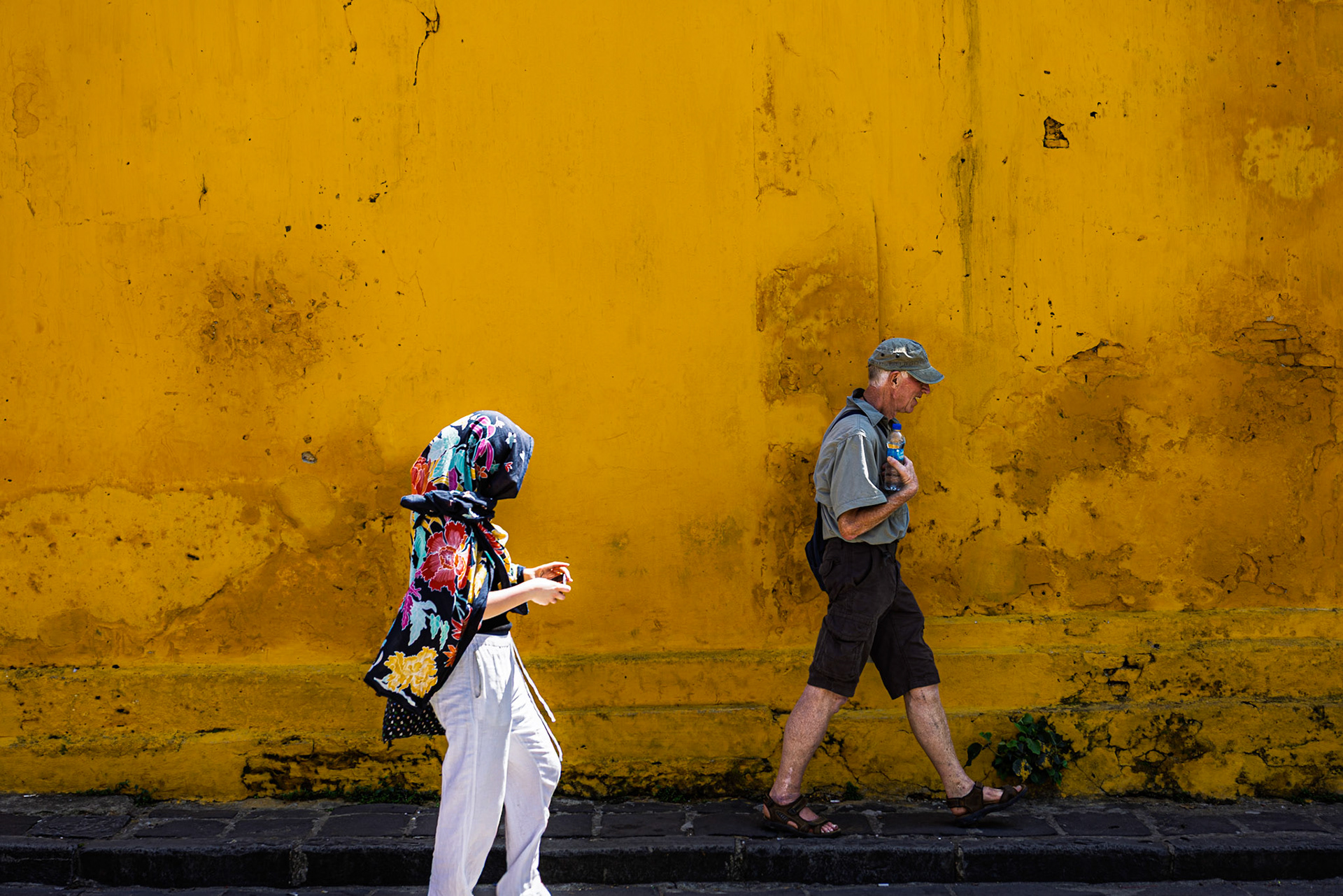 A burst of color against a timeless wall—ordinary steps turned extraordinary