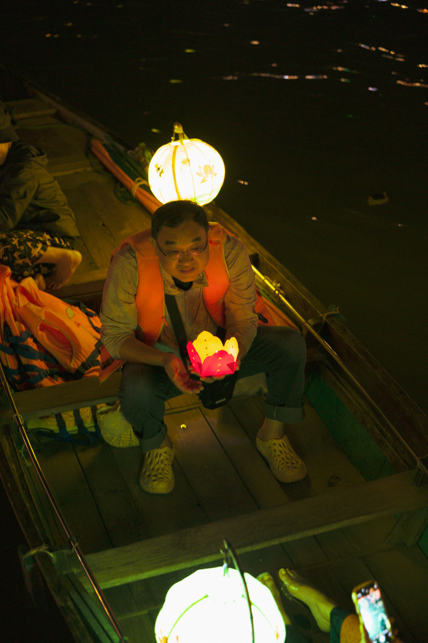 Under the glow of lanterns, quiet moments illuminate the soul