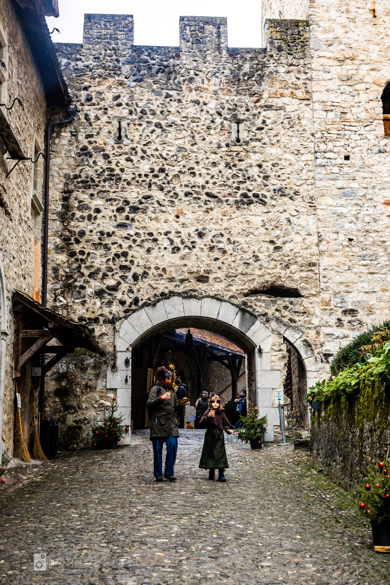 Through ancient gates, the echoes of history meet the footsteps of today