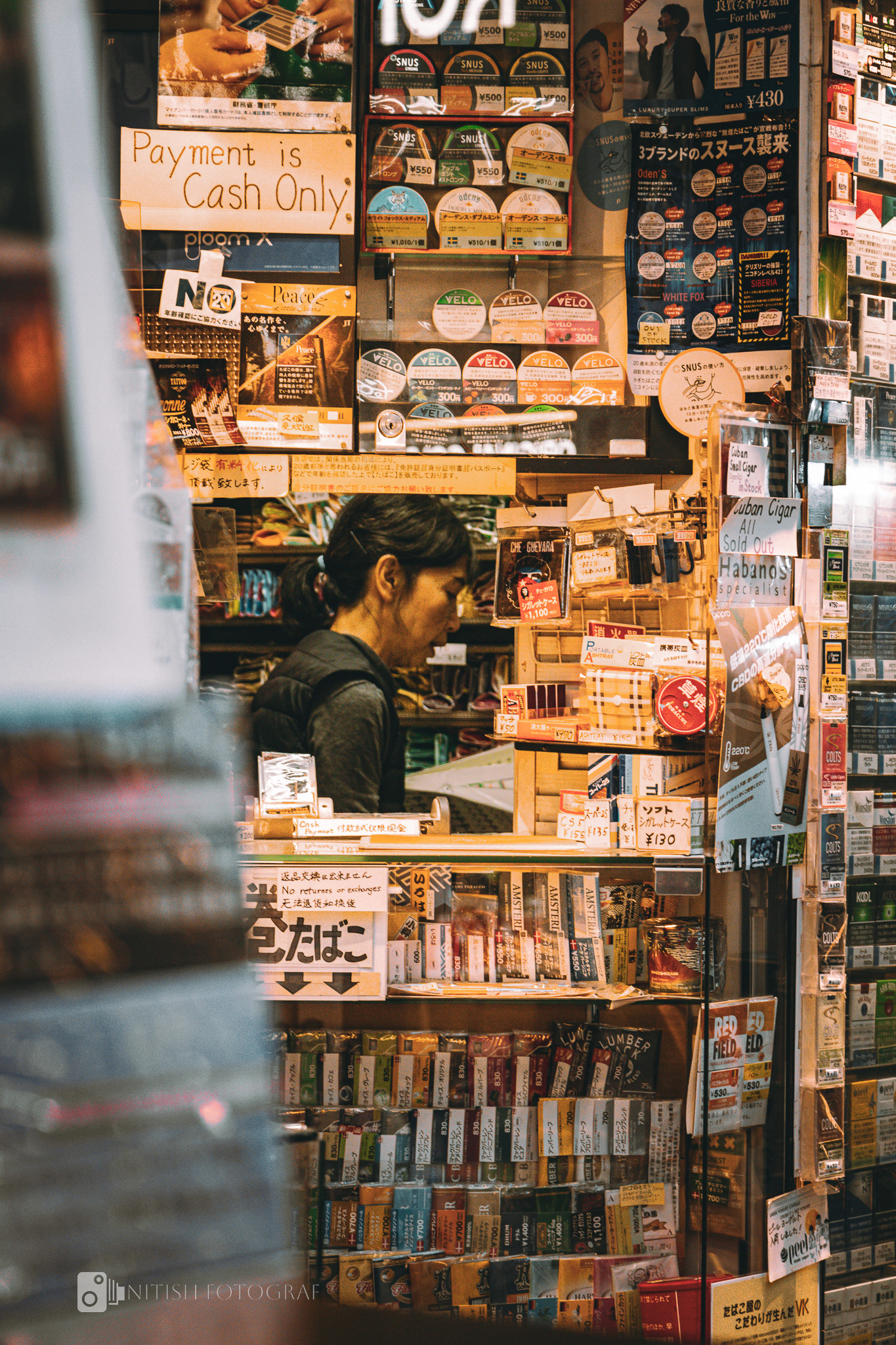 A shop stacked with stories, capturing a city’s heartbeat in its details.