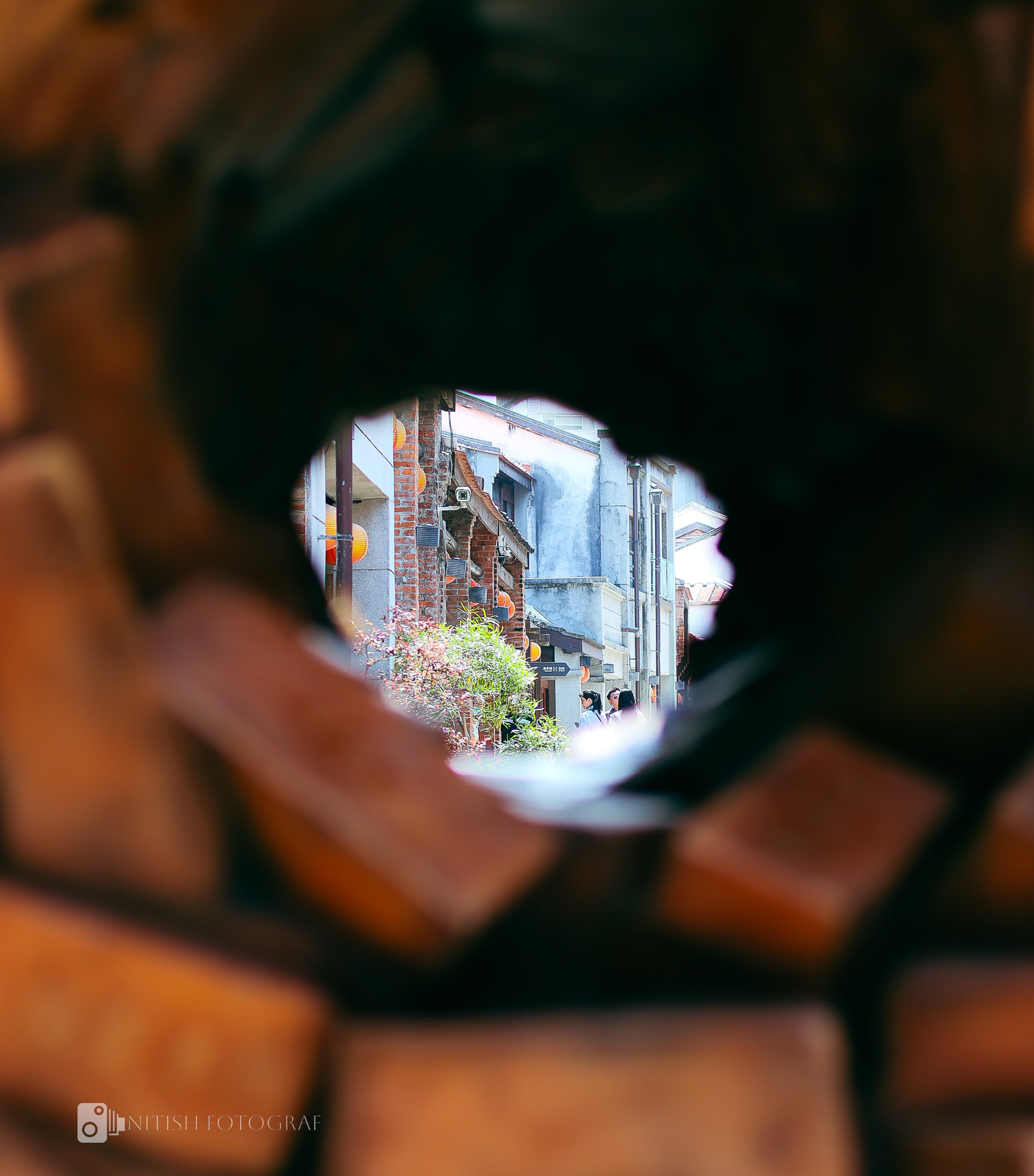 A glimpse of life – framed by the remnants of time