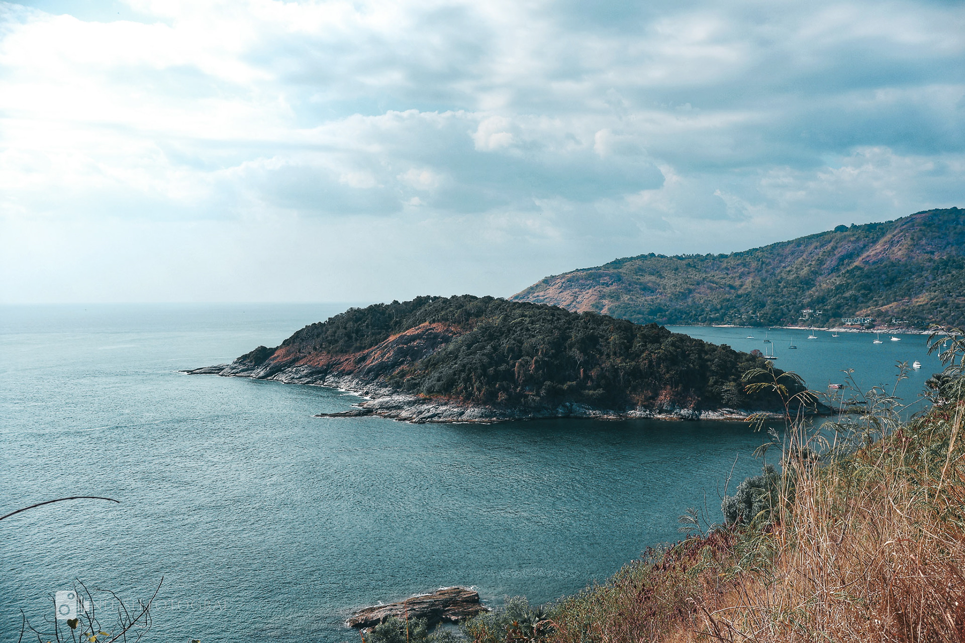 A secluded island surrounded by shimmering blue waters—a slice of paradise