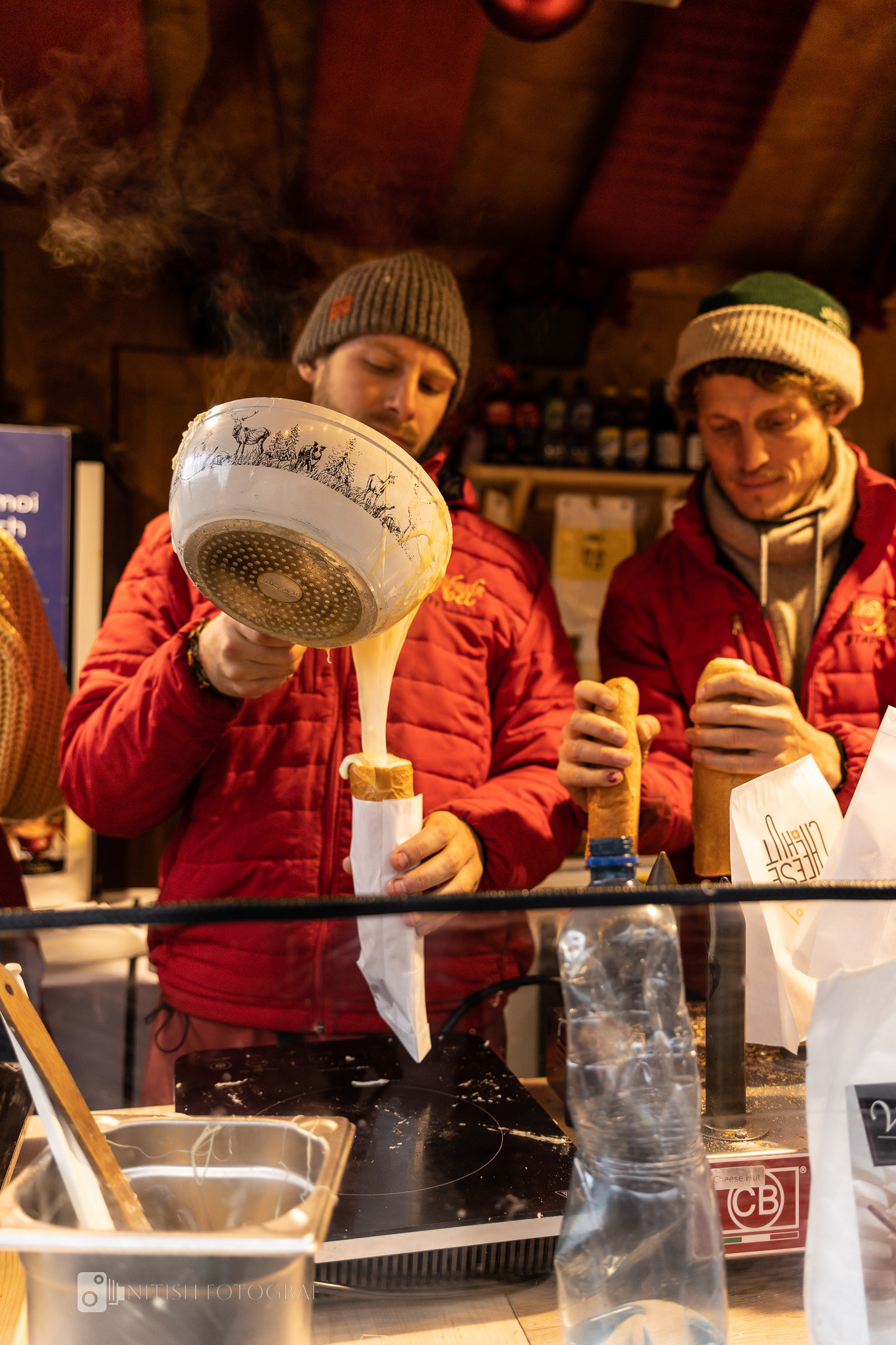 A festive indulgence at the Christmas market—cheese fondue served in a warm baguette, bringing joy to chilly nights