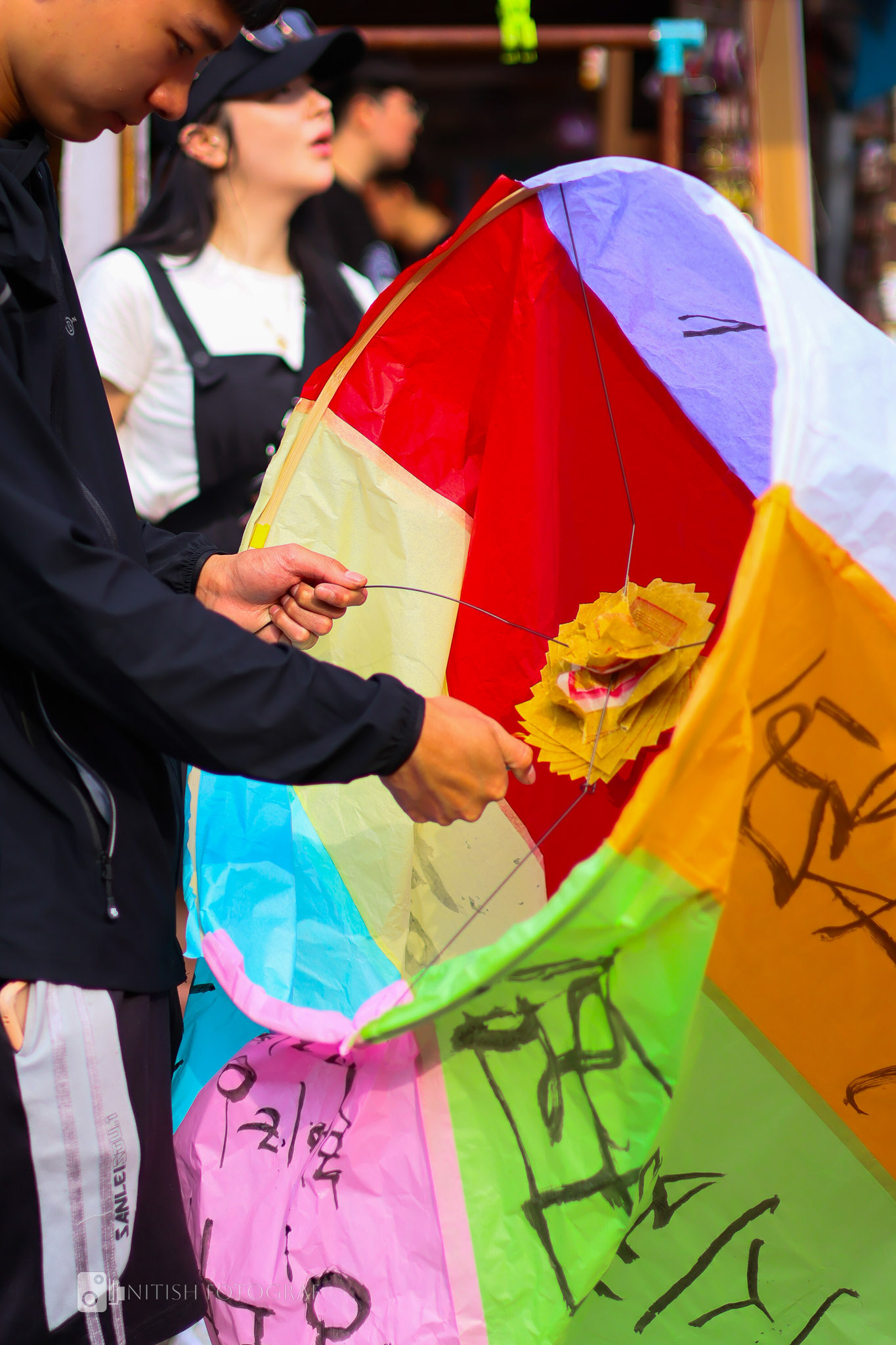 Reaching for the sky – a colorful dream takes flight from the bustling streets