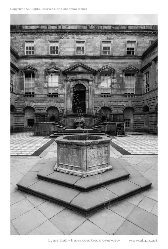 Lyme Hall inner courtyard - central font and main doorway  up steps.