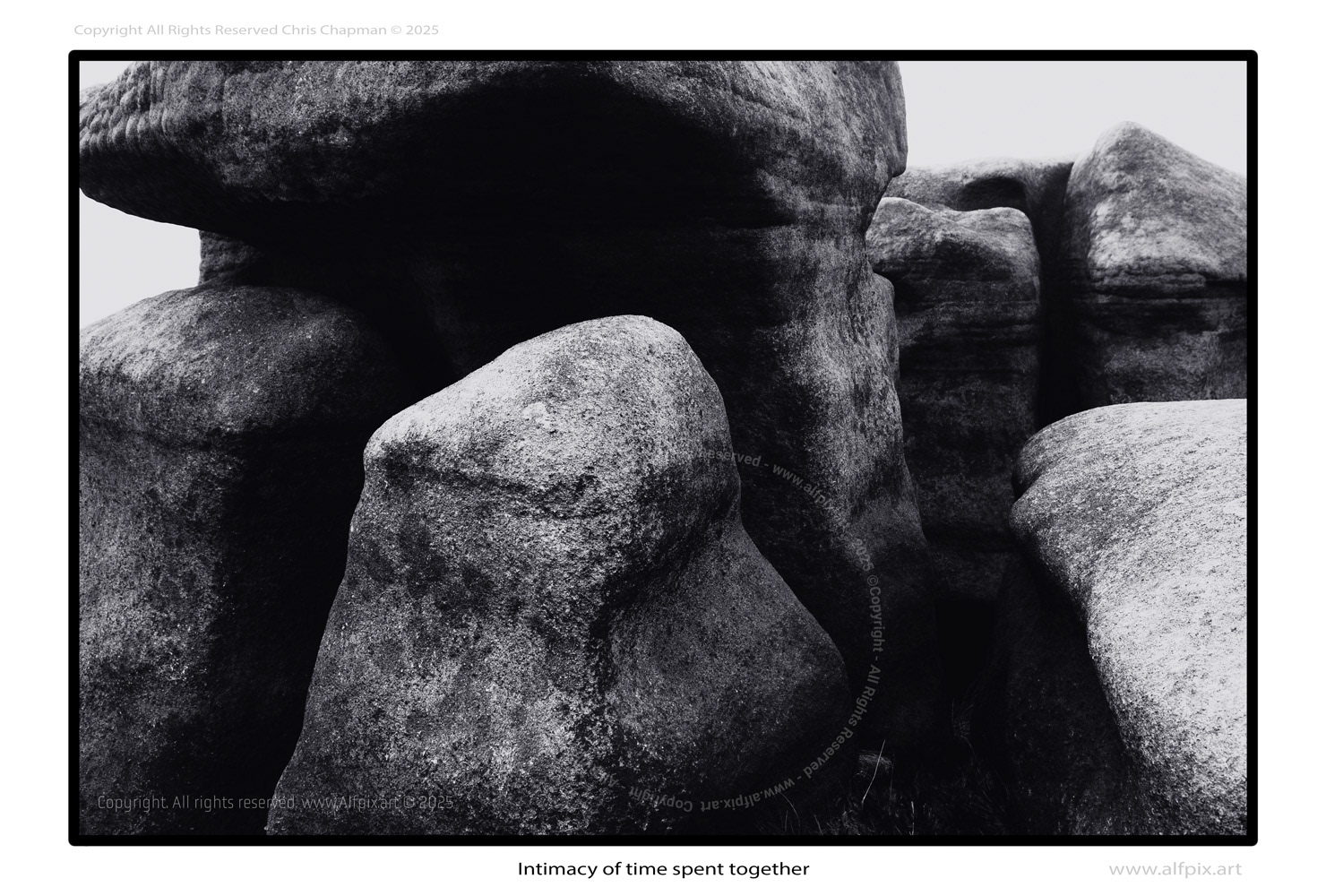Intimacy of time spent together. Black and White photograph. Woolpacks on Kinderscout. Near Edale. Derbyshire. Peak District National Park. 