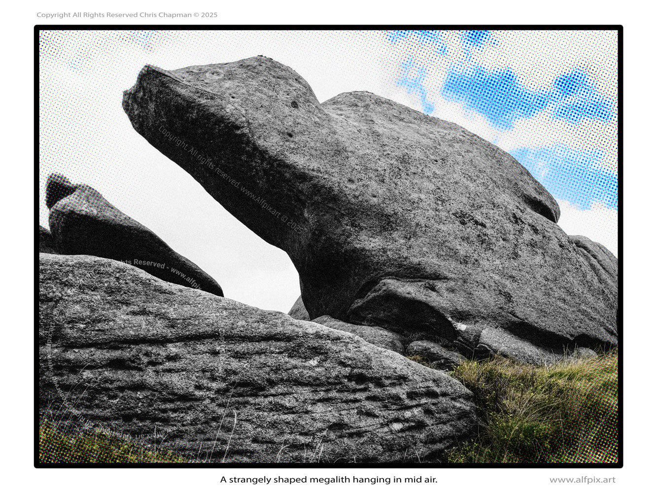 looking like  a mythical dragon captured mid flight. A strangely shaped rock. colour image.