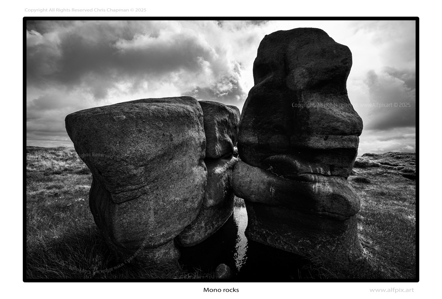Black & White photo. Mono rocks. Pool of water. Dark image. Cloudy sky. Alfpix.art