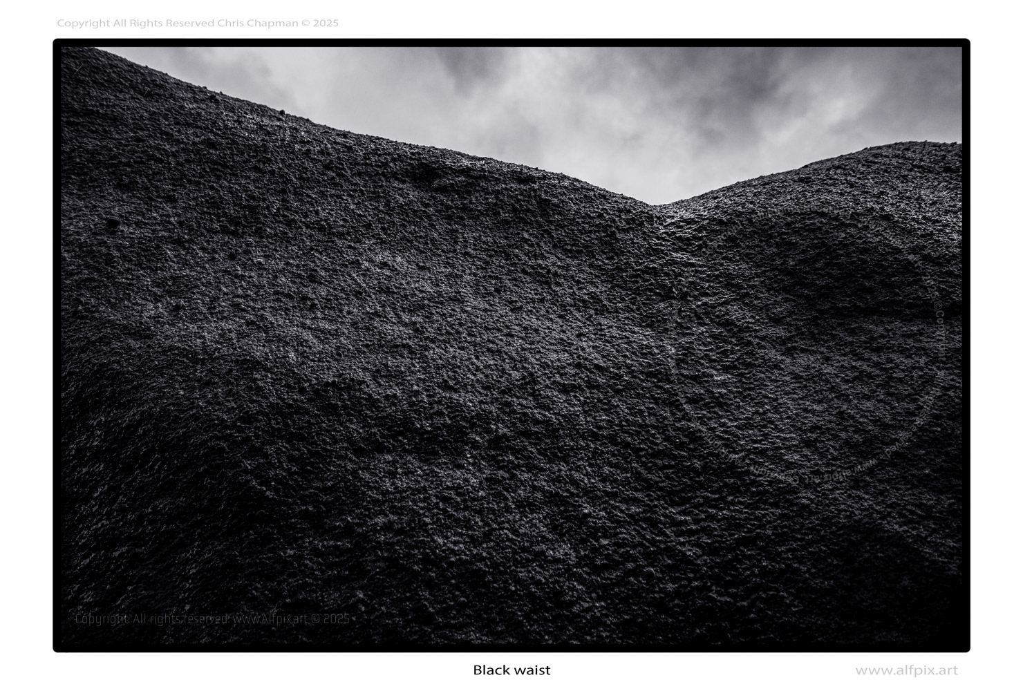 Black Waist. Monochrome image. Sky. Stone. Minimalist photograph.