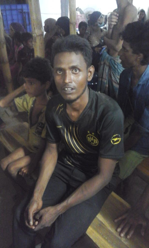 Boat survivors being screened (Withheld)