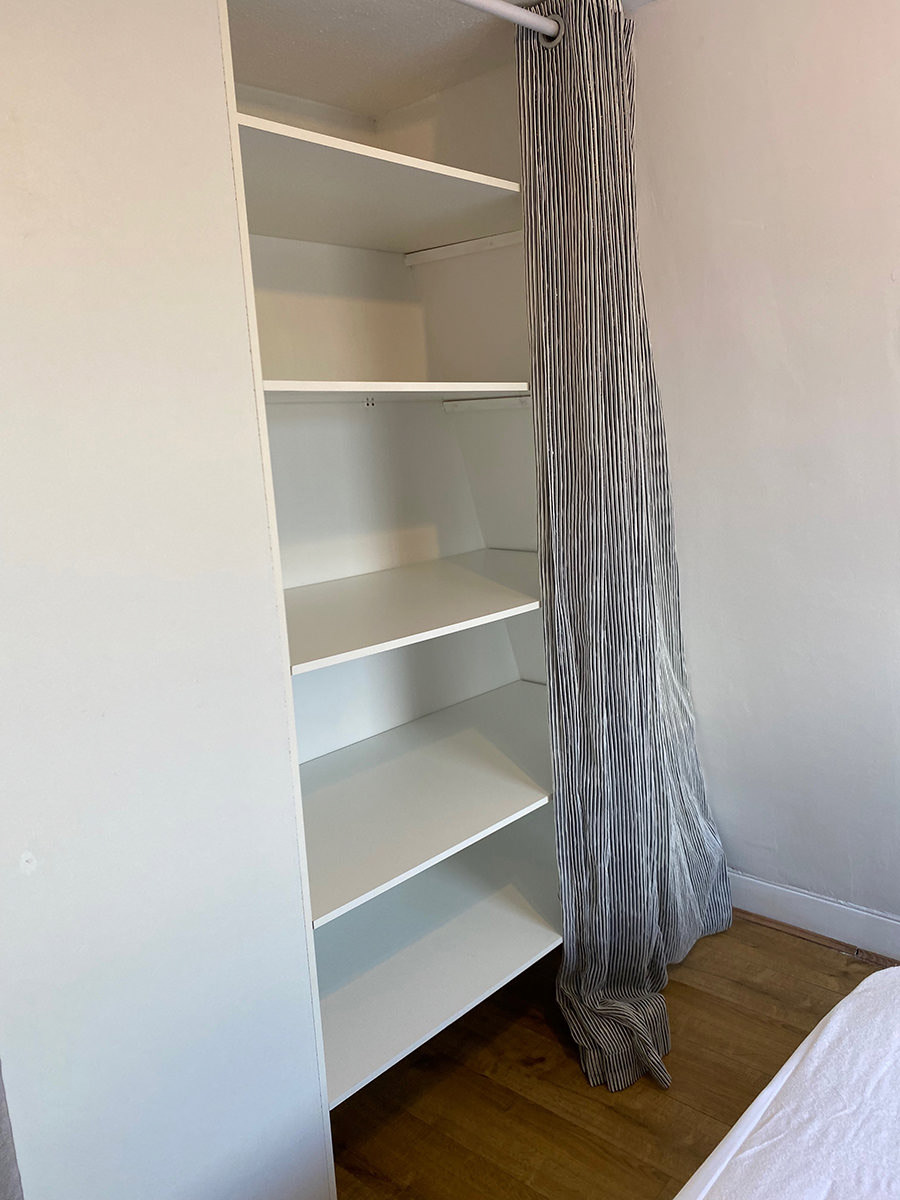 Bedroom: Large deep shelving unit