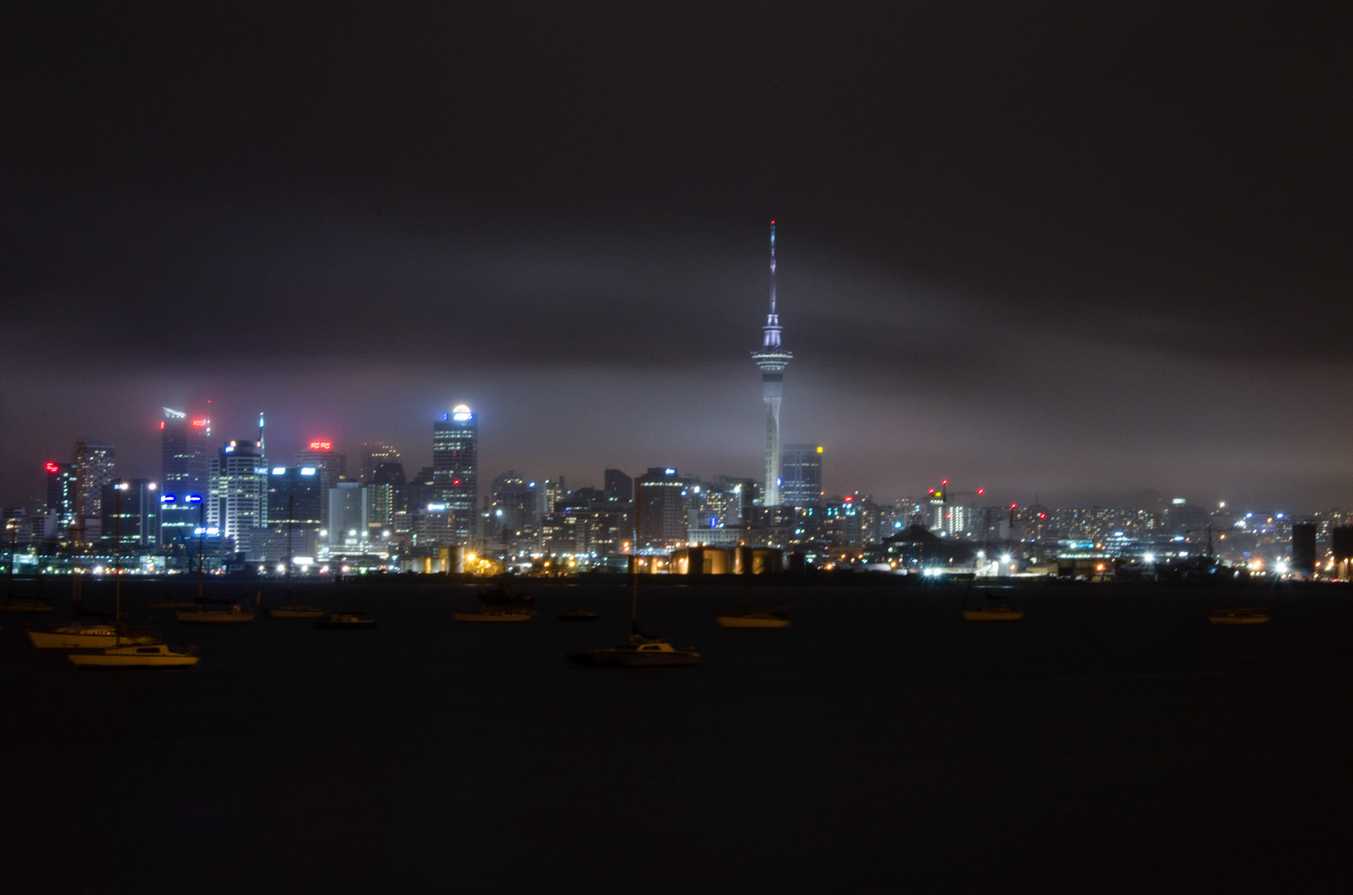 A photo of the Auckland cityscape taken on a rainy night