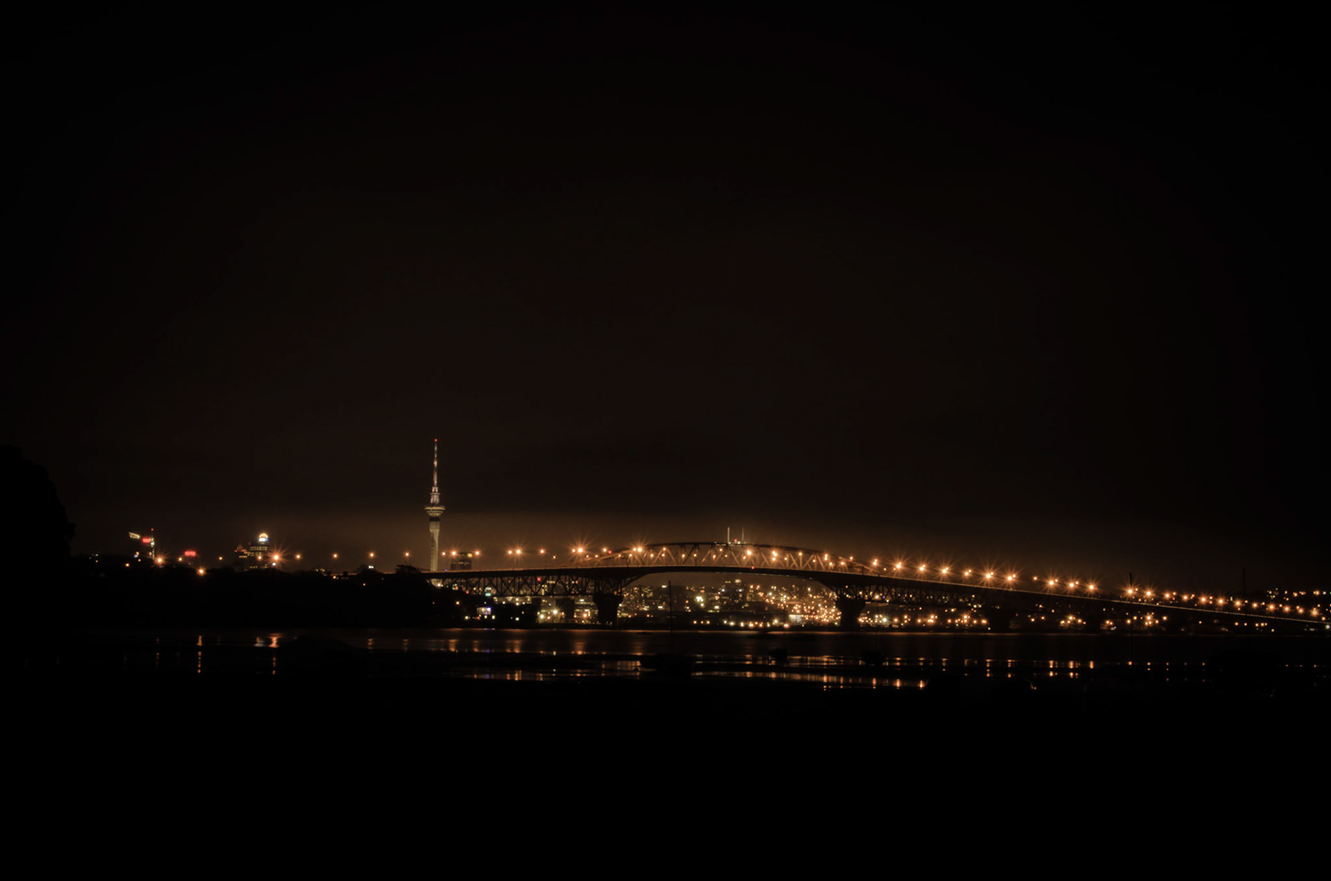 A photo of the Auckland cityscape taken on a rainy night