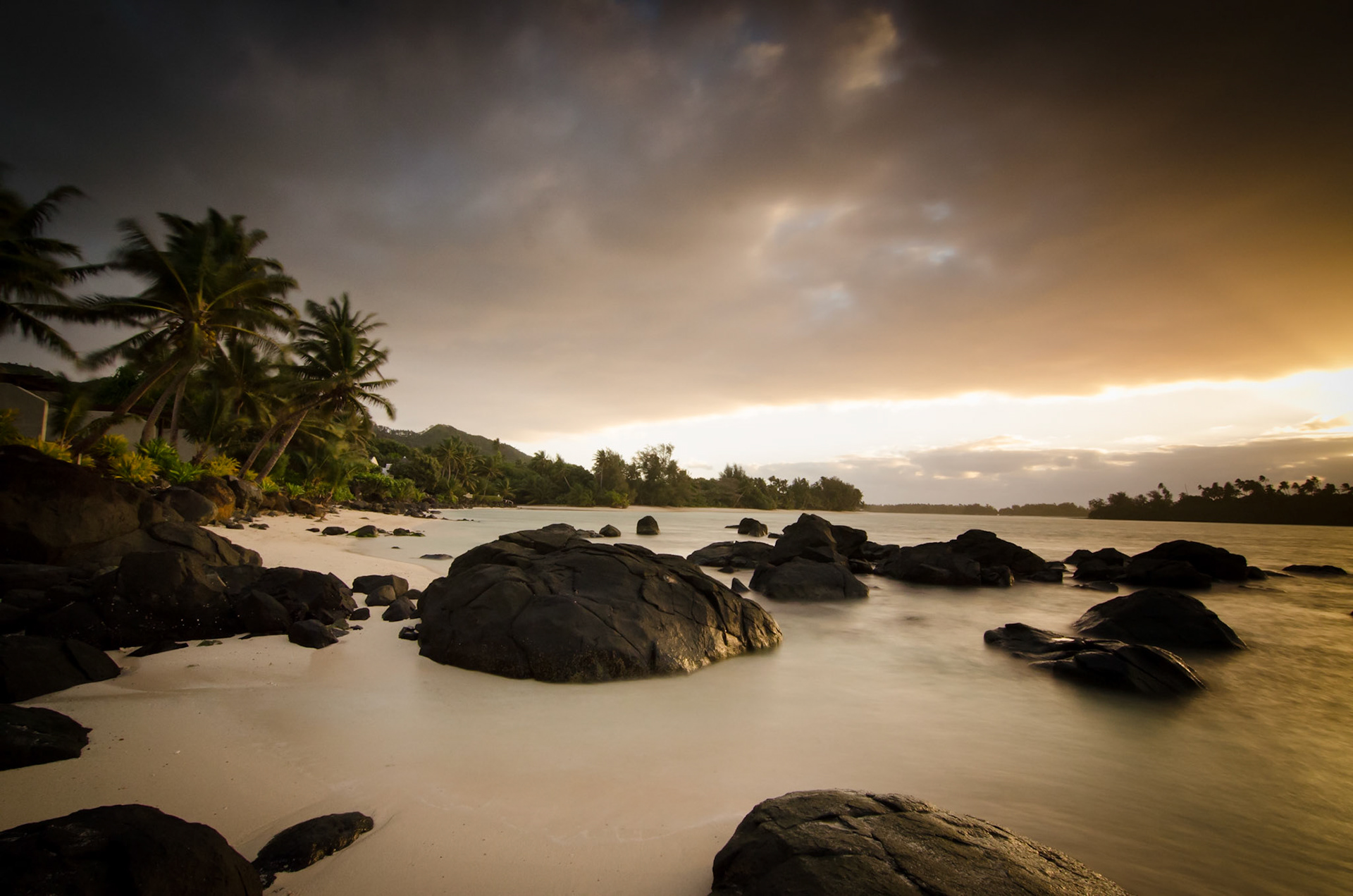 A long exposure shot of a sunrise on Muri Beach, Rarotonga