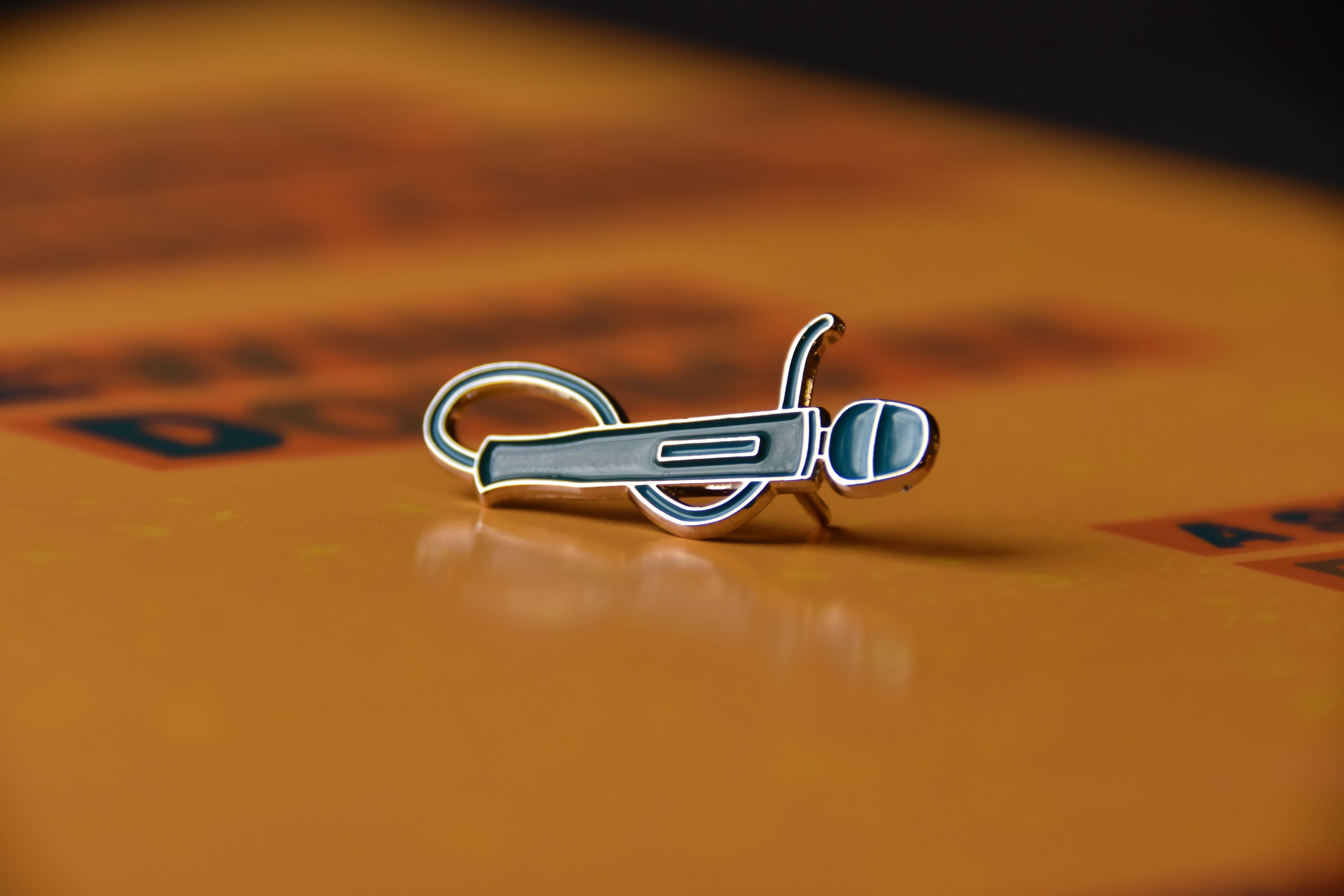 Completed enamel pin in hard enamel and silver plating