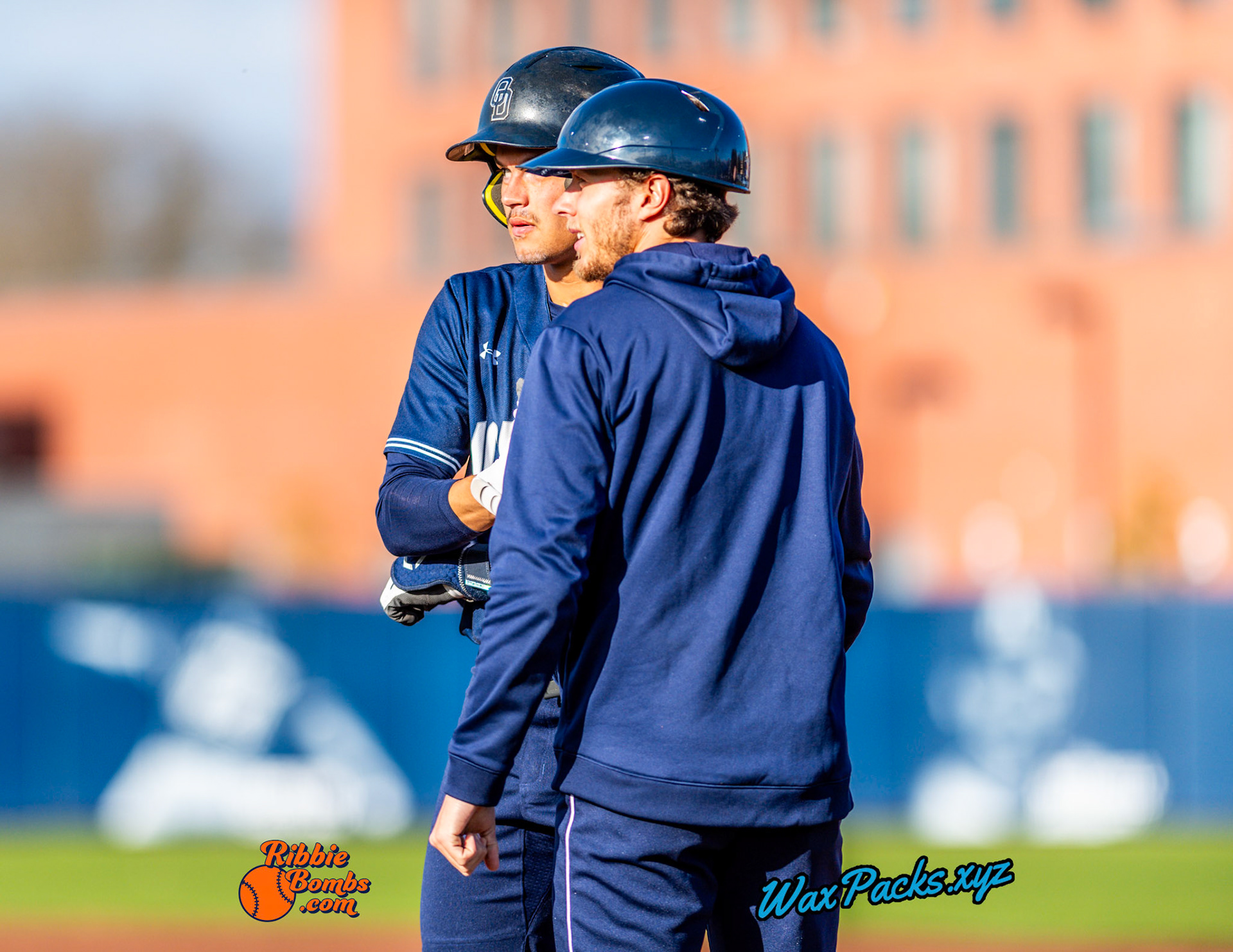 Shortstop Kyle Edwards (4) of Old Dominion talks with his first base coach after a single to left in the first inning of the second game of a three-game weekend series. The Monarchs defeated the 49ers, 4-1, at Bud Metheny Baseball Stadium on the campus of Old Dominion University in Norfolk, VA, on Saturday, March 2, 2024.  (Photo Credit Chad W. via www.WaxPax.xyz via Getty Images, Copyright © WaxPacks.xyz WaxPacks.xyz™ 2024)
