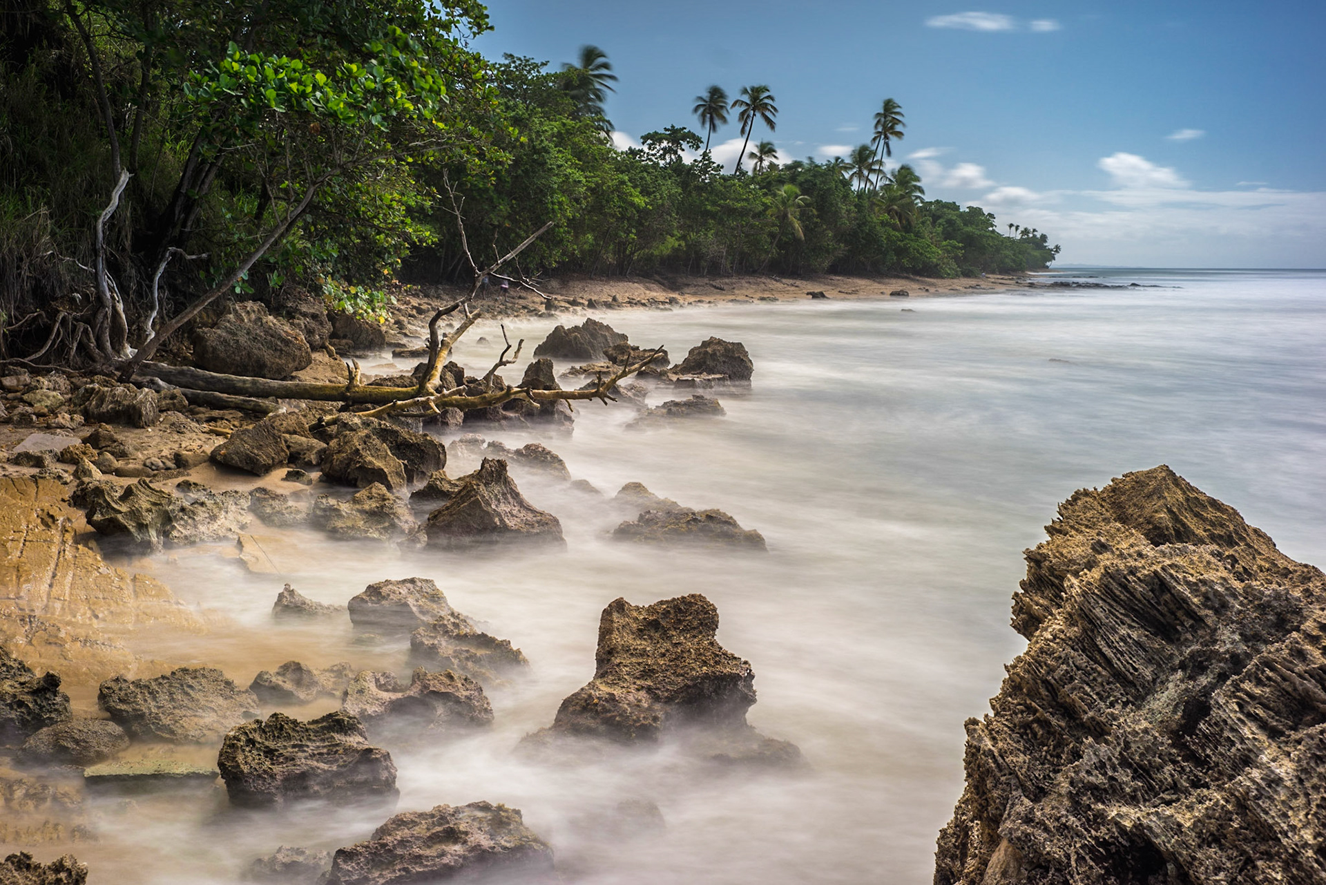 Surfing in Rincon Puerto Rico... Long exposure of the Oceans created a cloudy atmoshere look