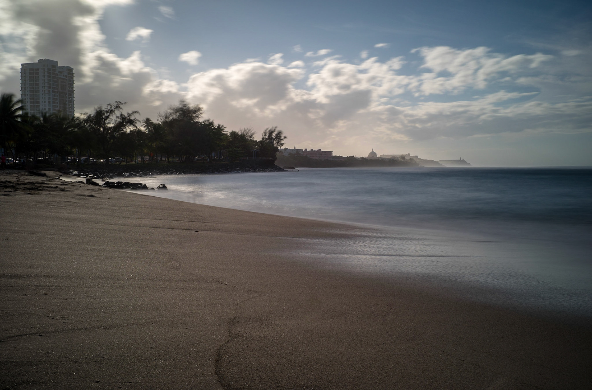 Surfing in Rincon Puerto Rico... Long exposure of the Oceans created a cloudy atmoshere look
