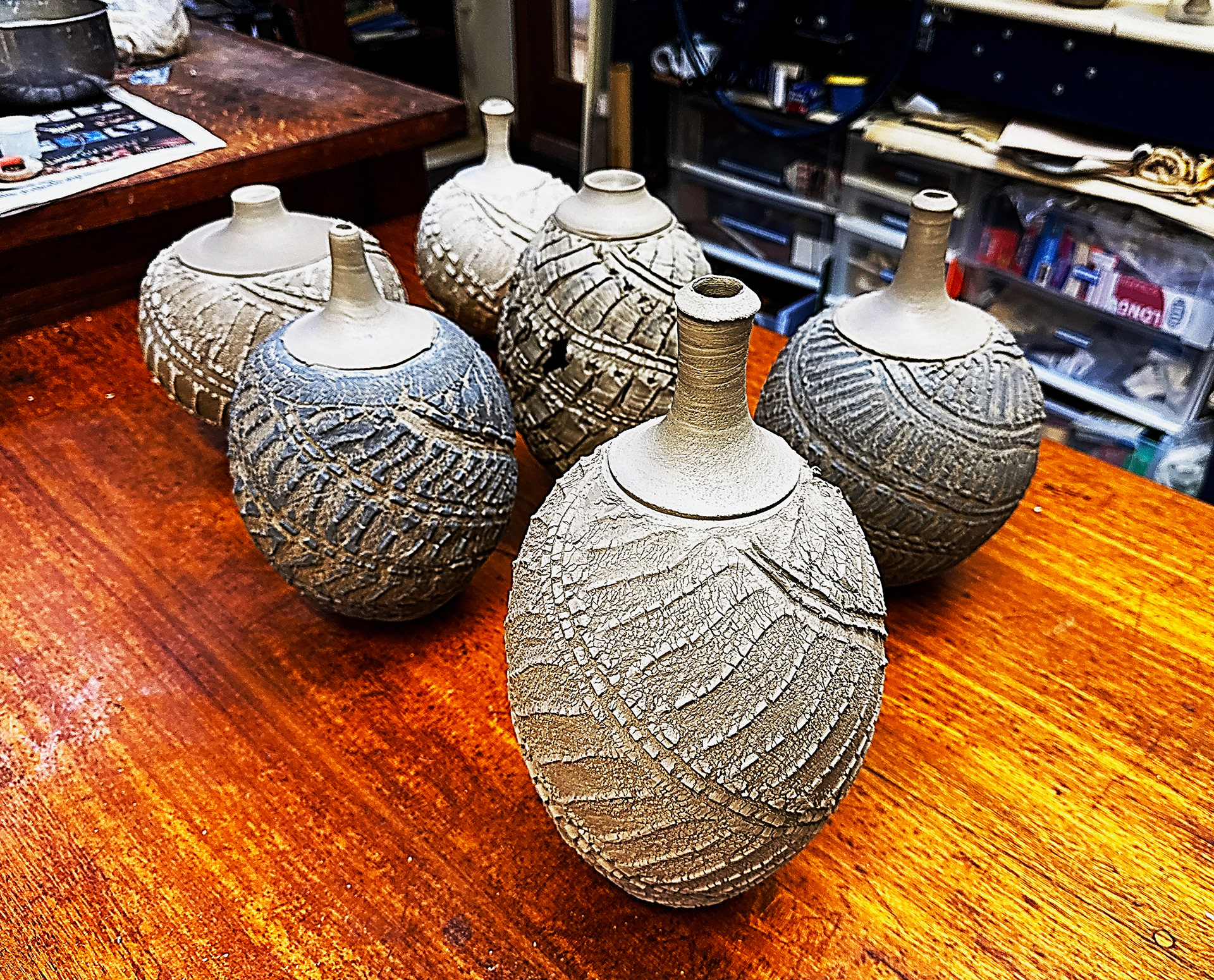 Freshly made pieces drying before bisque firing.