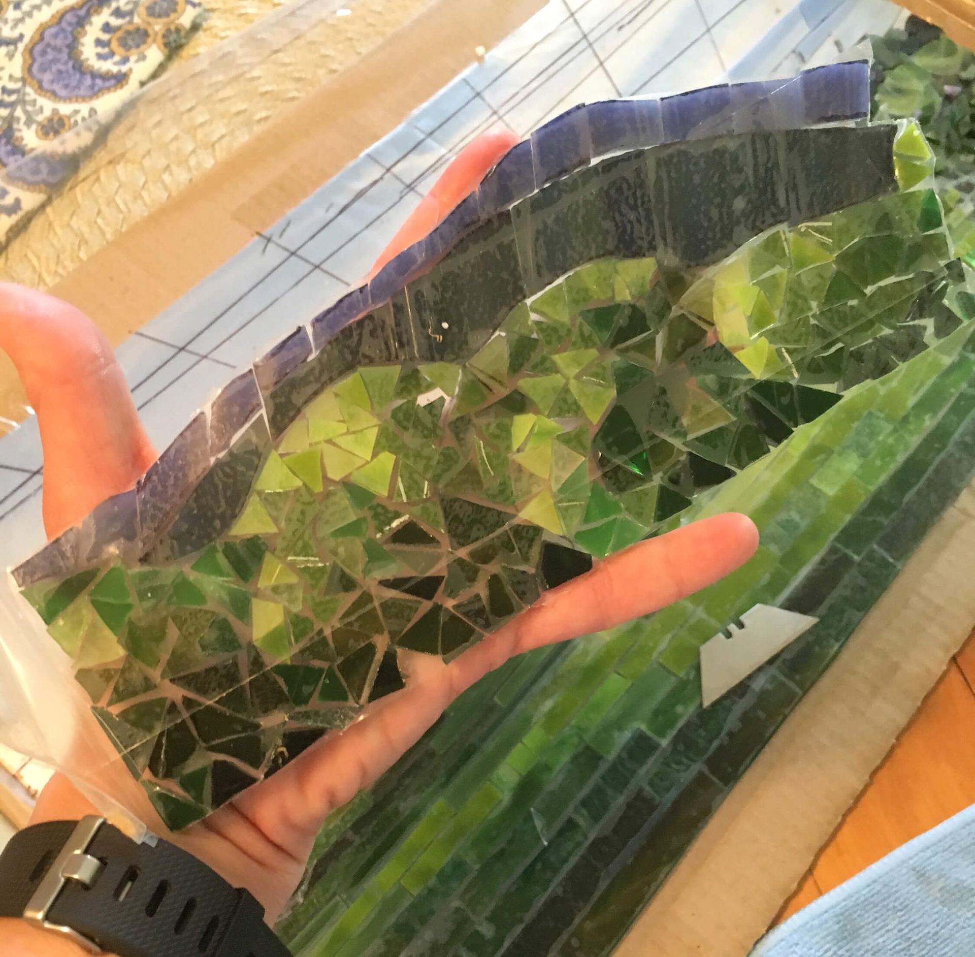 Holding the taped trees and mountains
