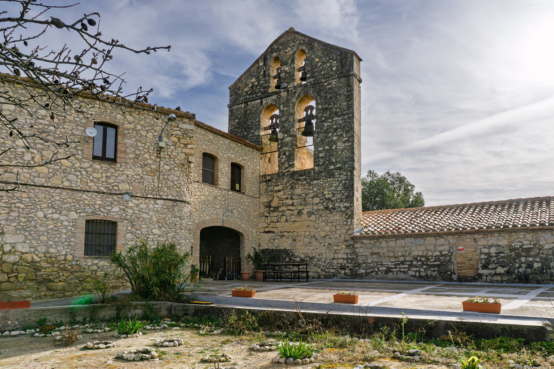 The priest’s humble abode, keeping watch over the ancient church.