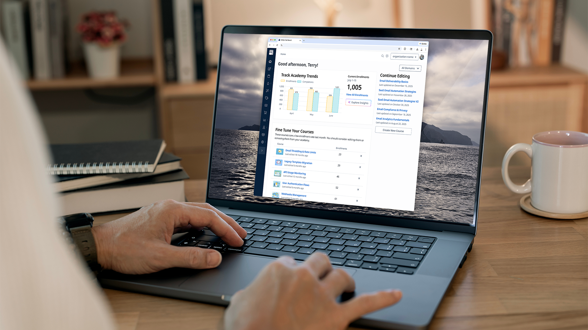 A laptop with the new Skilljar dashboard home page.
