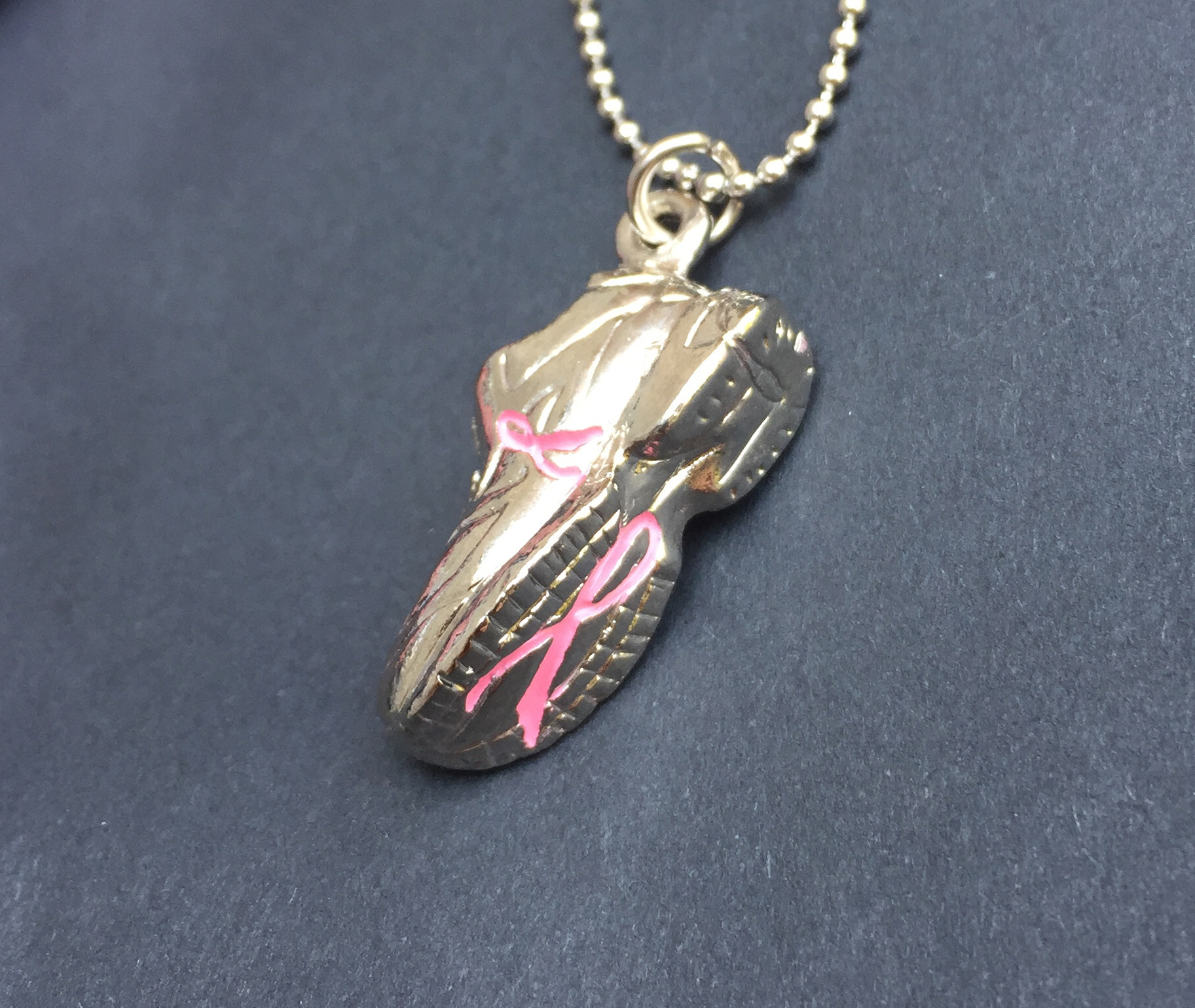 3D Cast Metal shoe design for a Breast Cancer run fundraiser.  I created the concept, as well as the technical specifications for manufacturing.