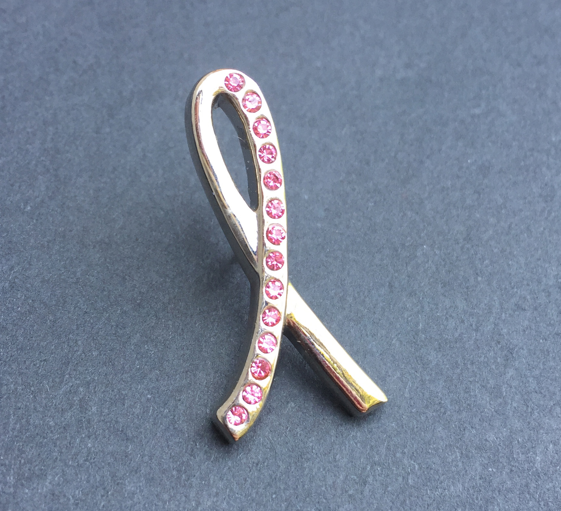 Upscale lapel pin for Breast Cancer Awareness.  As a designer I created the concept and set up the technical specifications for manufacturing.