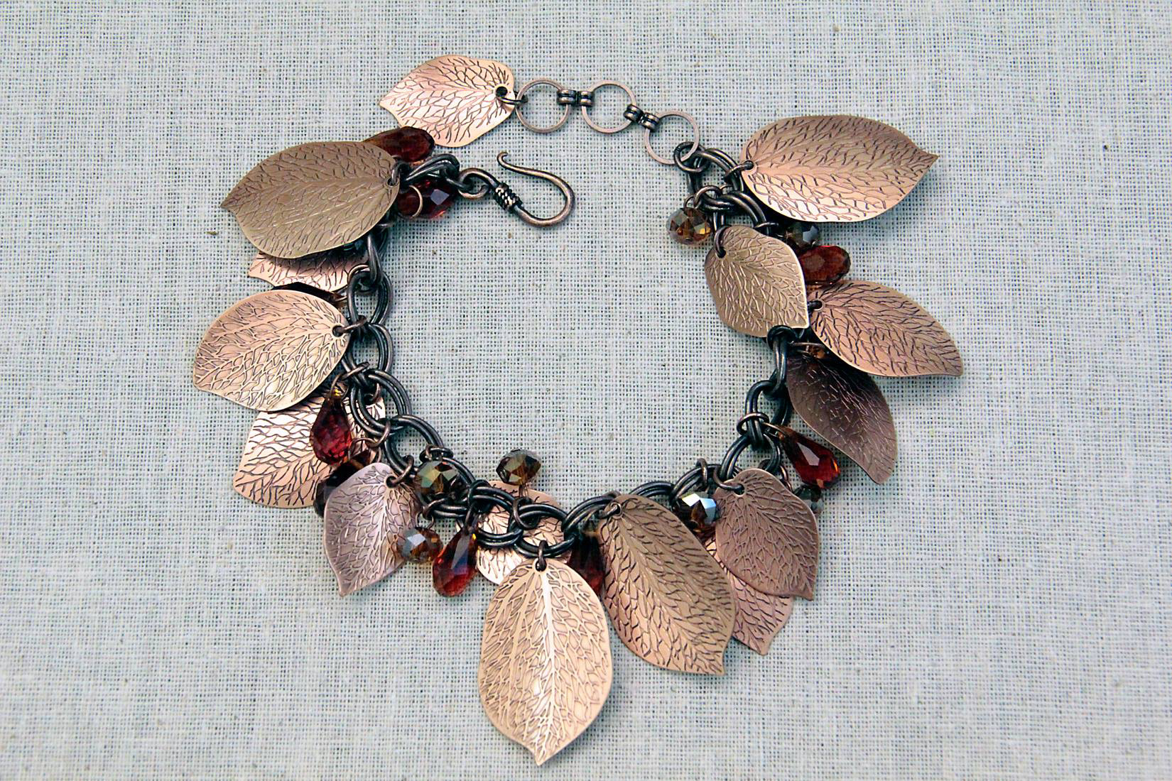 Bracelet design I worked on.  The leaf charms were designed for this product and I created all the necessary specifications and drawings for mass production manufacturing.