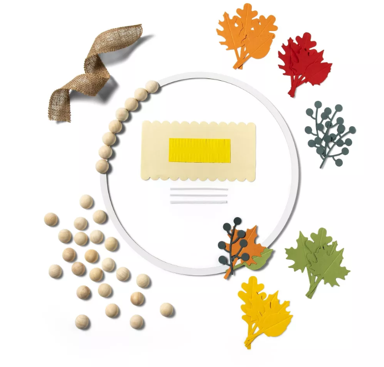 Layout of components for the Wreath Making Kit I designed for Target's Mondo Llama.  The craft kit included wood beads, ribbon, die cut felt, paper and tissue paper.