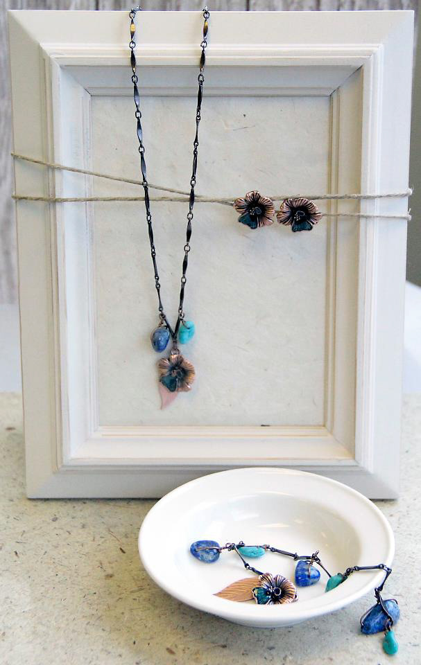 Necklace and Earrings I designed with custom 3D cast flower charms that I  designed and created specifications for mass production.