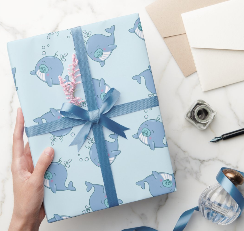 Baby whale illustration I drew placed on wrapping paper for a baby shower.  I created the repeat print pattern for the wrapping paper. This is work I did as a freelance children's illustrator for a line of baby shower products.