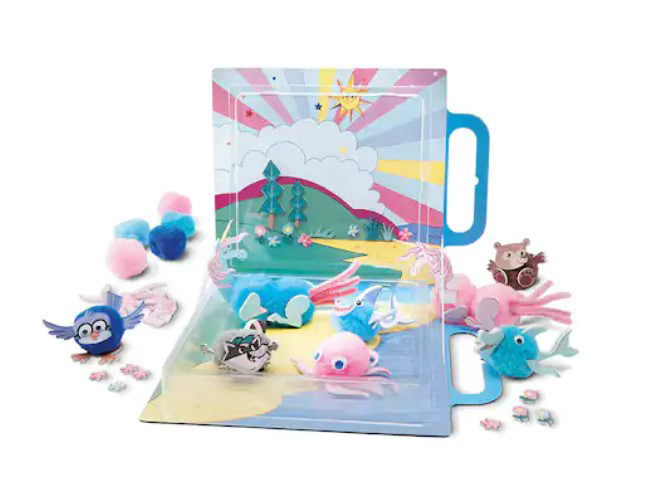 Travel activity kit for kids that I designed as a freelancer collaborating with interal teams for Michael's Creatology line.