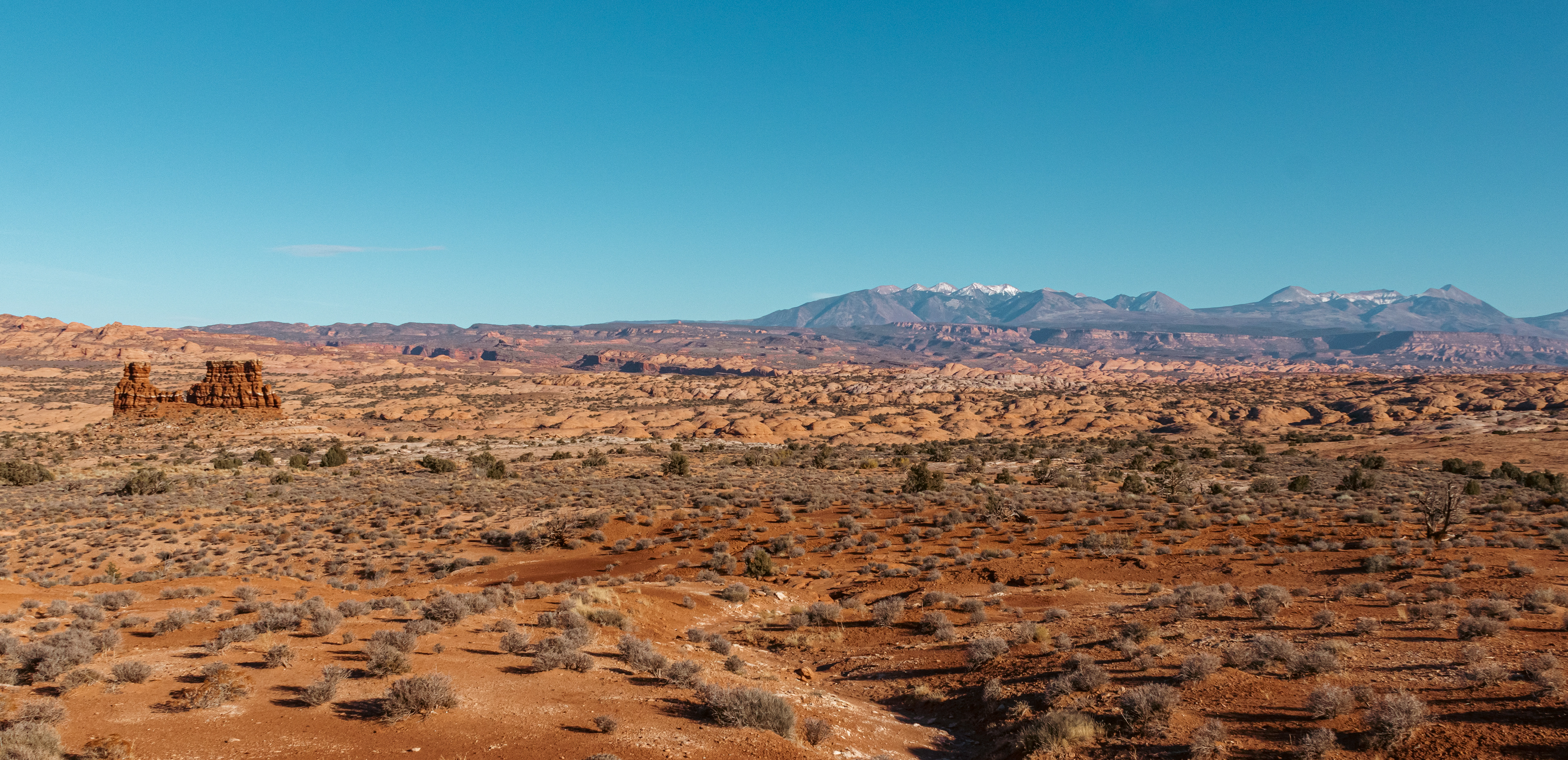 Open field, distant mountains... the call for adventure