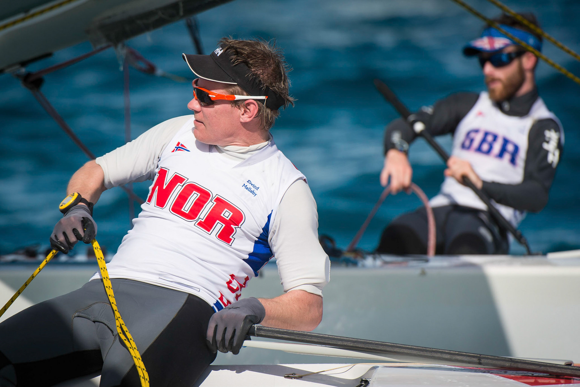 Bow no: 10 // Sail no: NOR 8376 // Skipper: Eivind Melleby, NOR // Crew: Mark Strube, USA; Bow no: 95 // Sail no: GBR 8317 // Skipper: Luke Patience, GBR // Crew: Jamie Buchan, USA